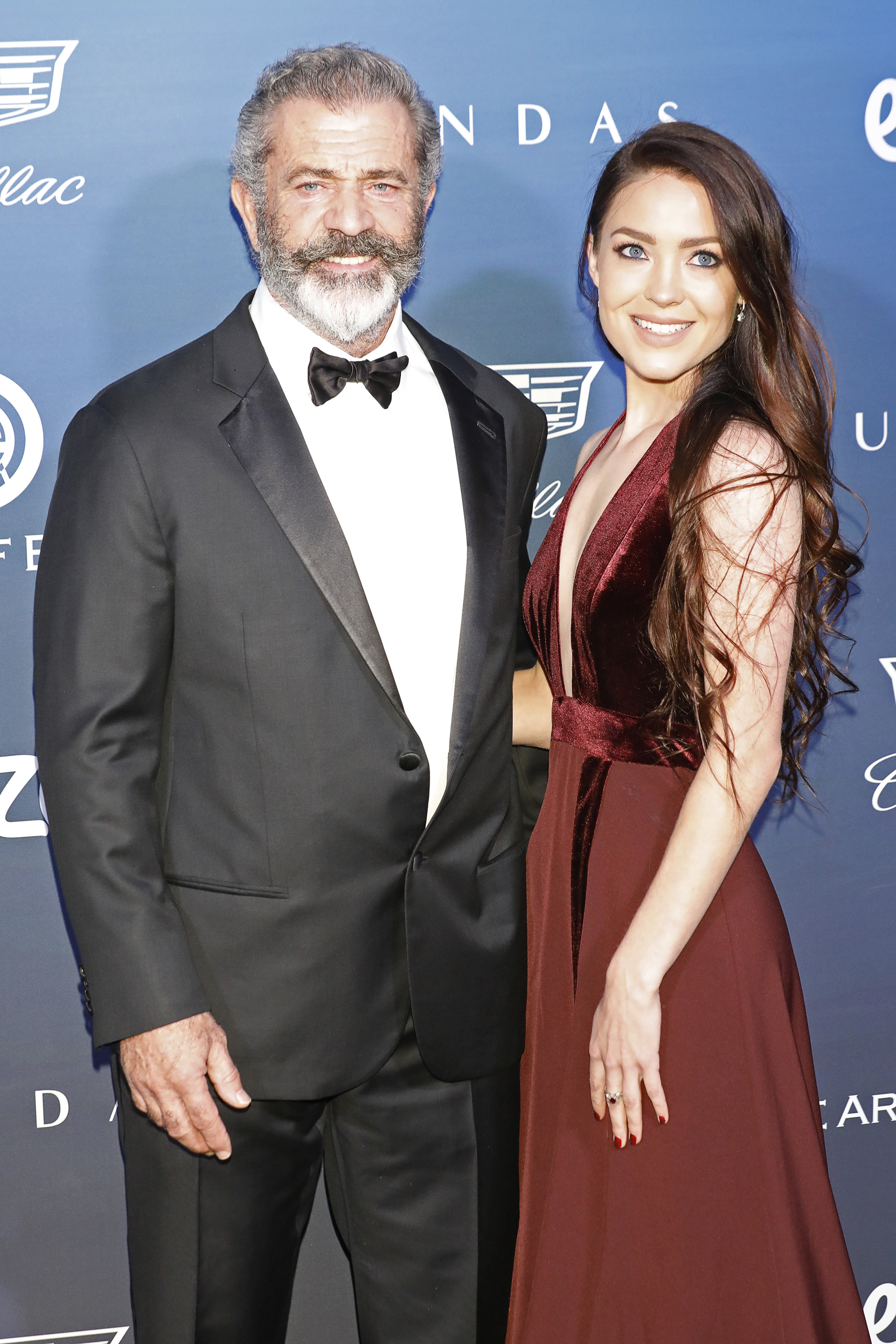 Mel Gibson with longtime girlfriend Rosalind Ross attending "Heaven" the "The Art of Elysium's 12th Annual Black Tie Artistic Experience" on January 5, 2019 in Los Angeles, California. / Source: Getty Images