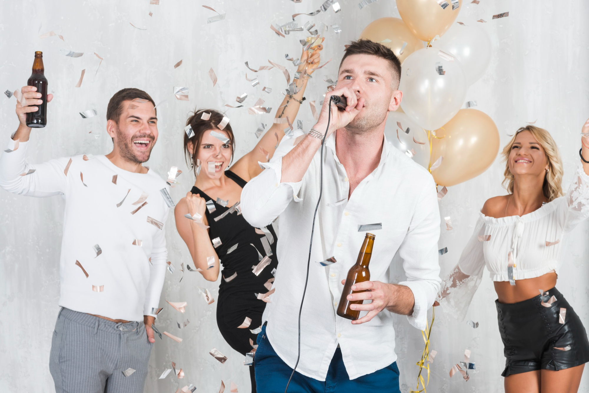 A man making an announcement at a party | Source: Freepik