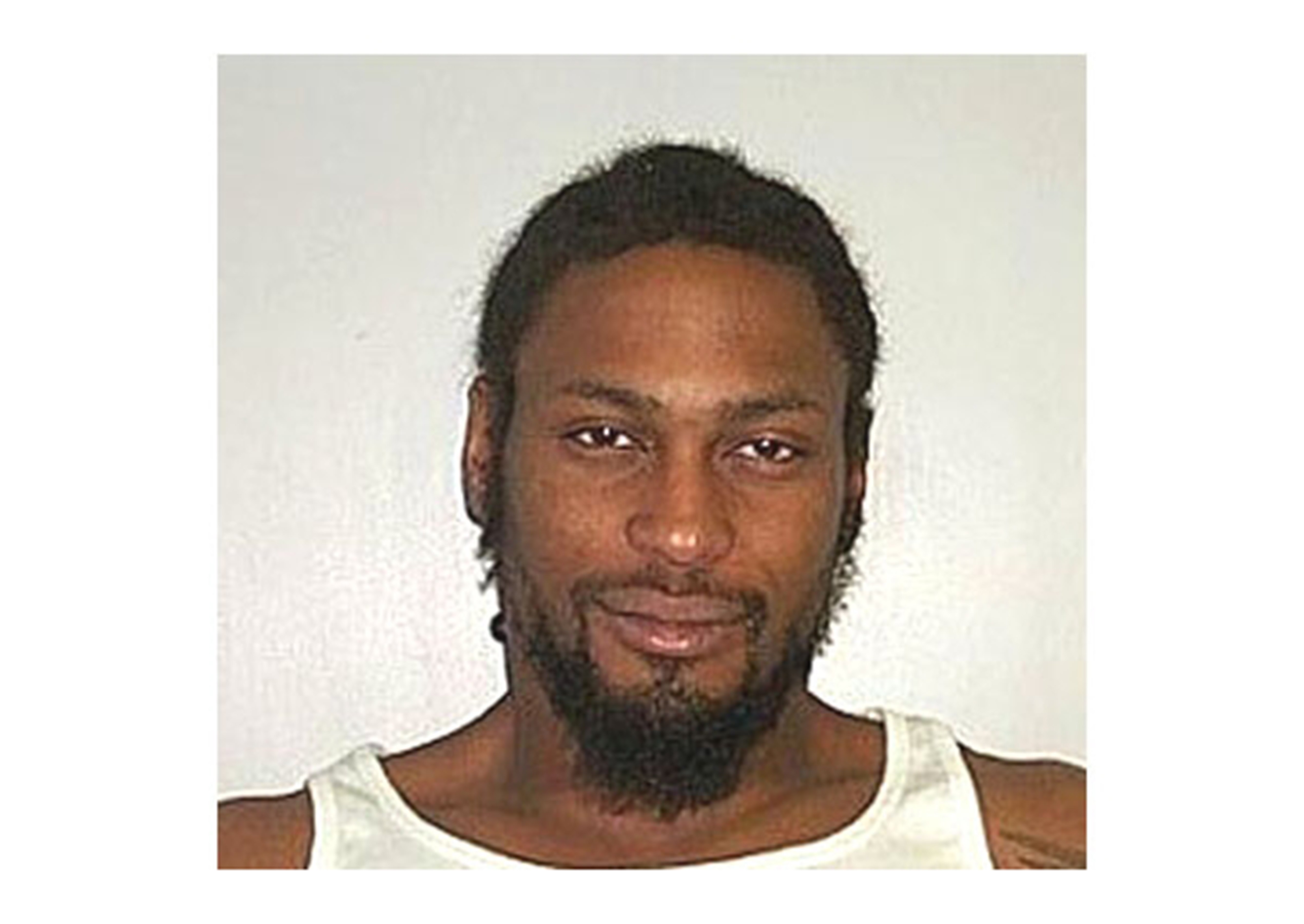 D'Angelo's mug shot after he was arrested in Virginia in the 2000s. | Source: Getty Images
