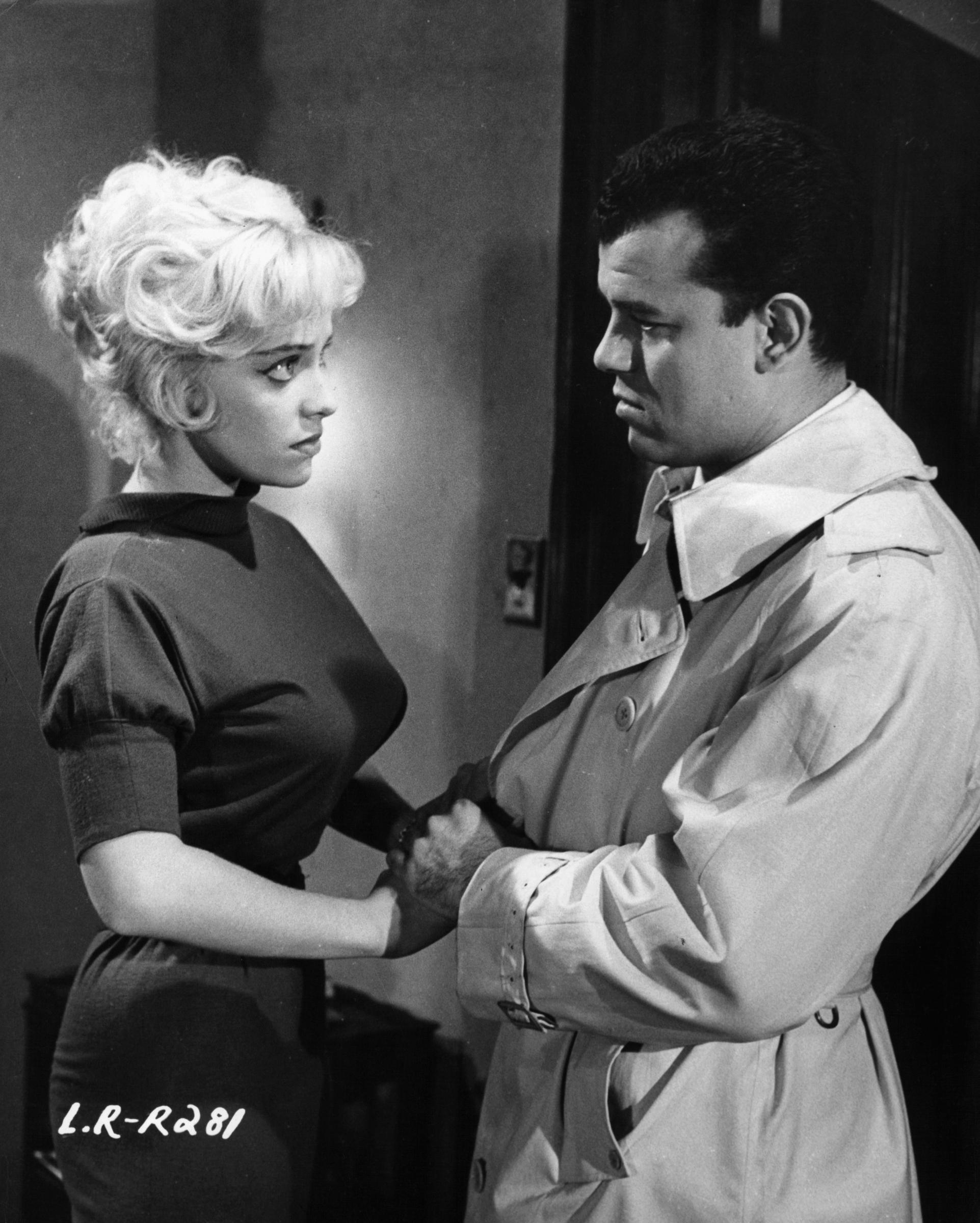 The actress with Julius LaRosa in a scene from the film "Let's Rock" in 1958. | Source: Getty Images