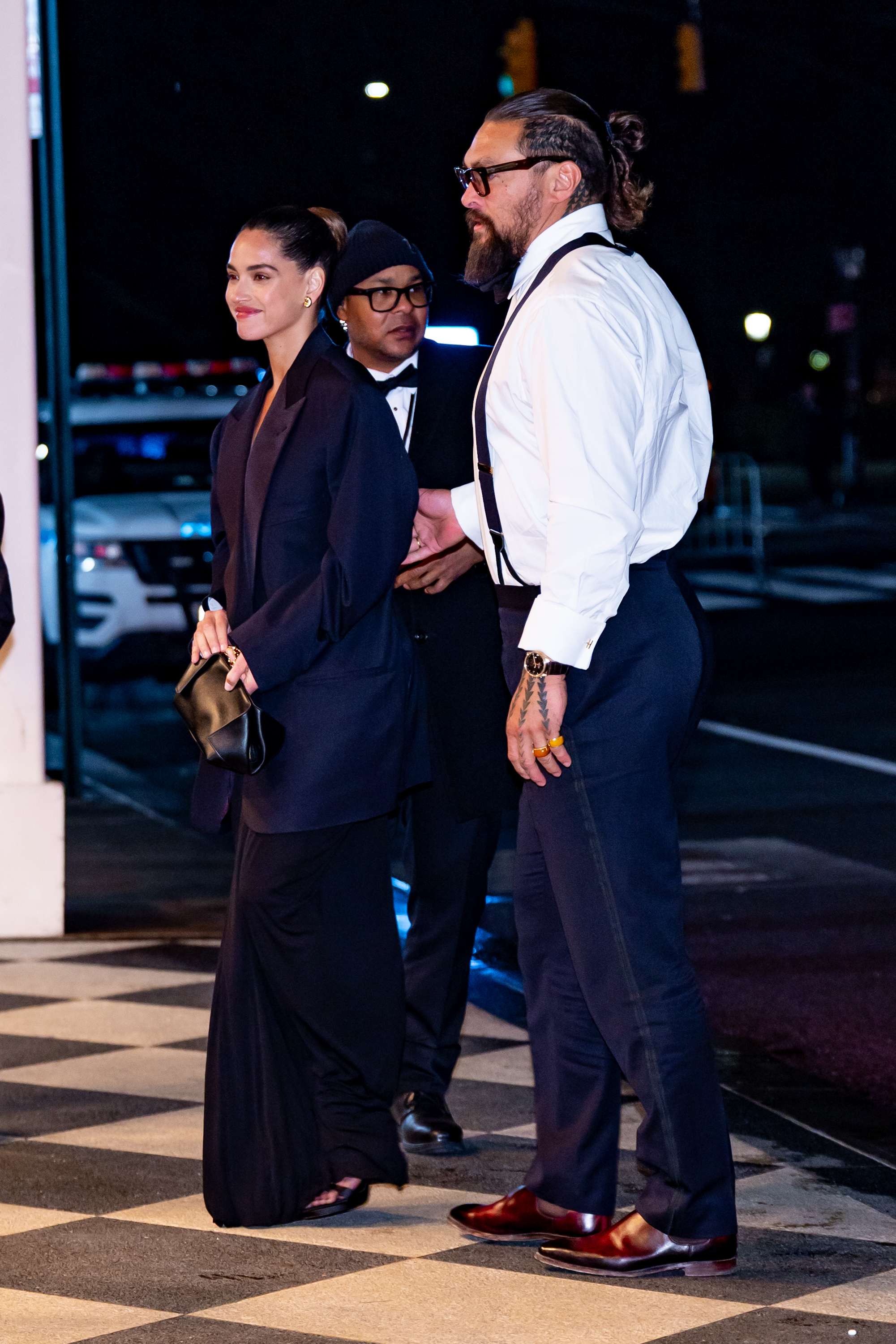 Adria Arjona and Jason Momoa are seen arriving at The Plaza Hotel on February 16, 2025, in New York City | Source: Getty Images