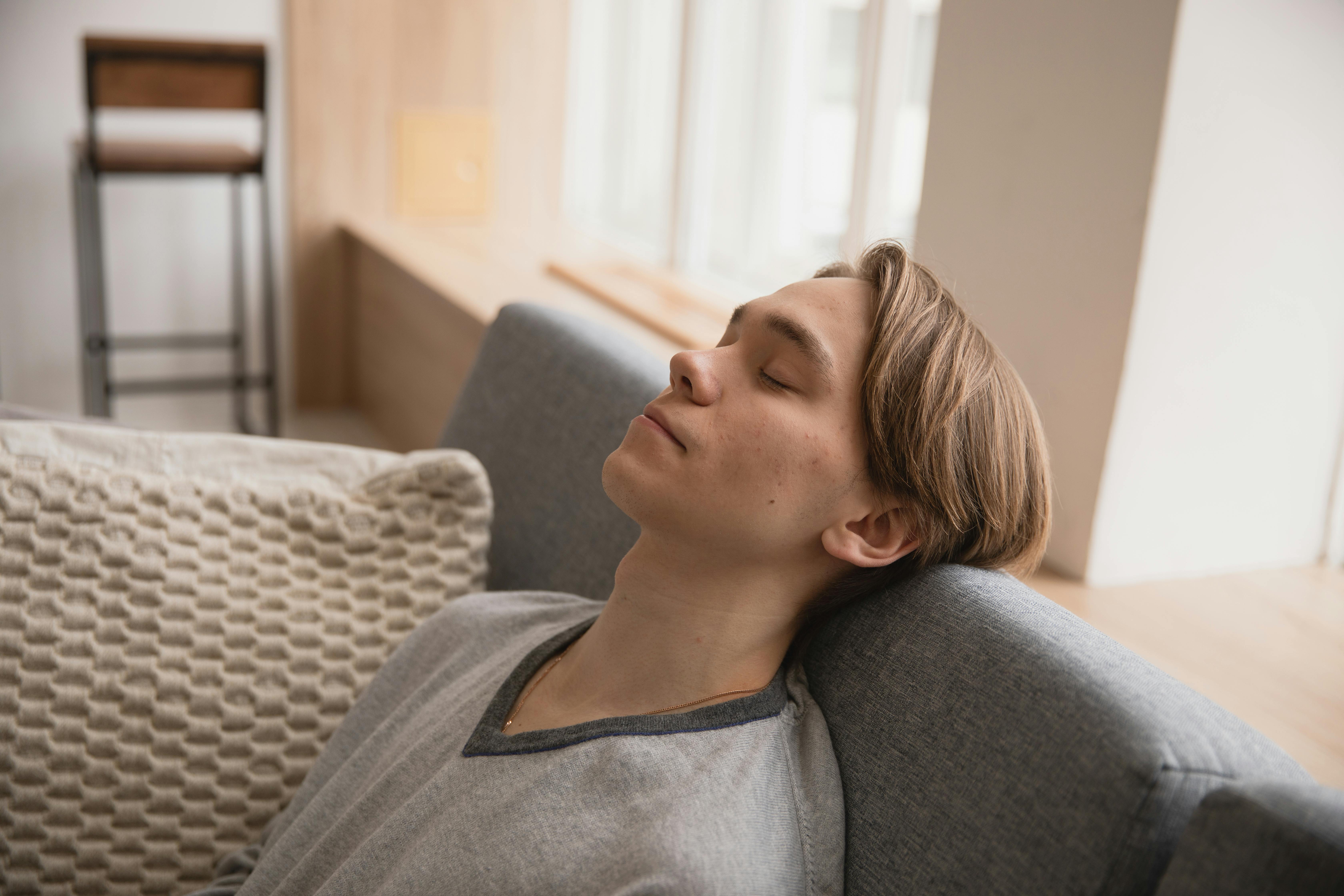 A man sleeping on sofa | Source: Pexels