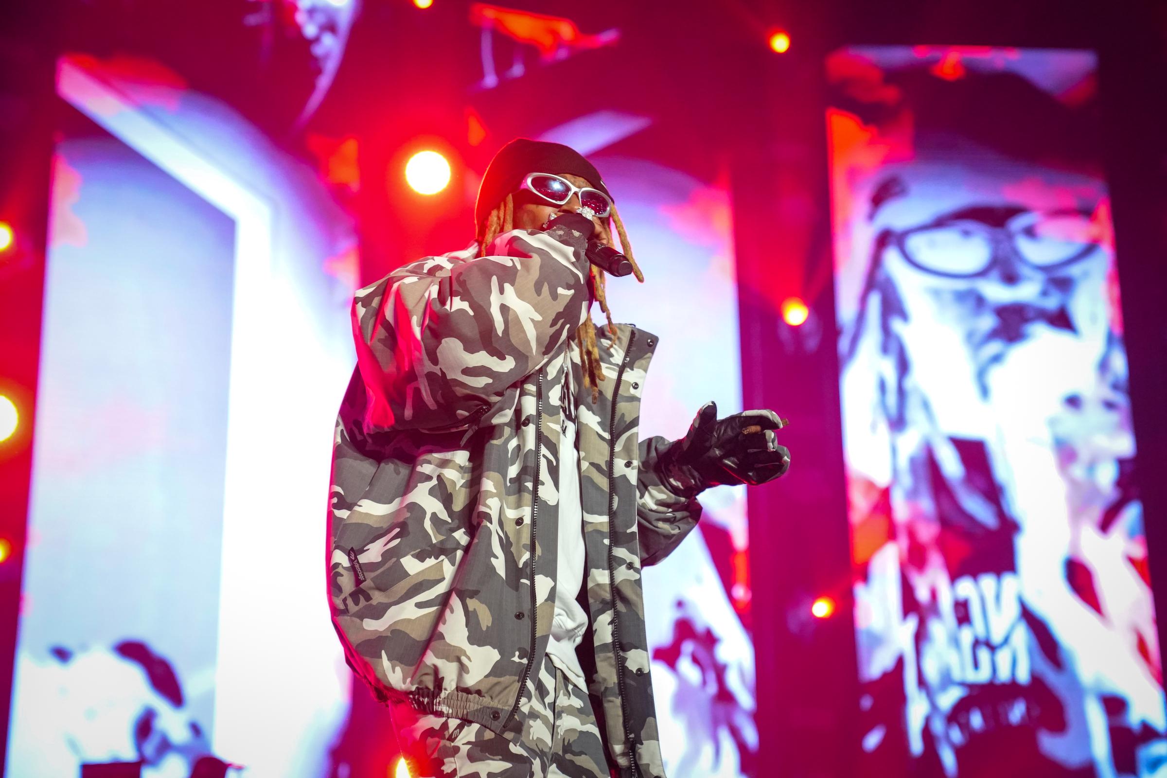 Lil Wayne performing during the AT&T Playoff Playlist Live! concert on January 18, 2025, in Atlanta, Georgia. | Source: Getty Images