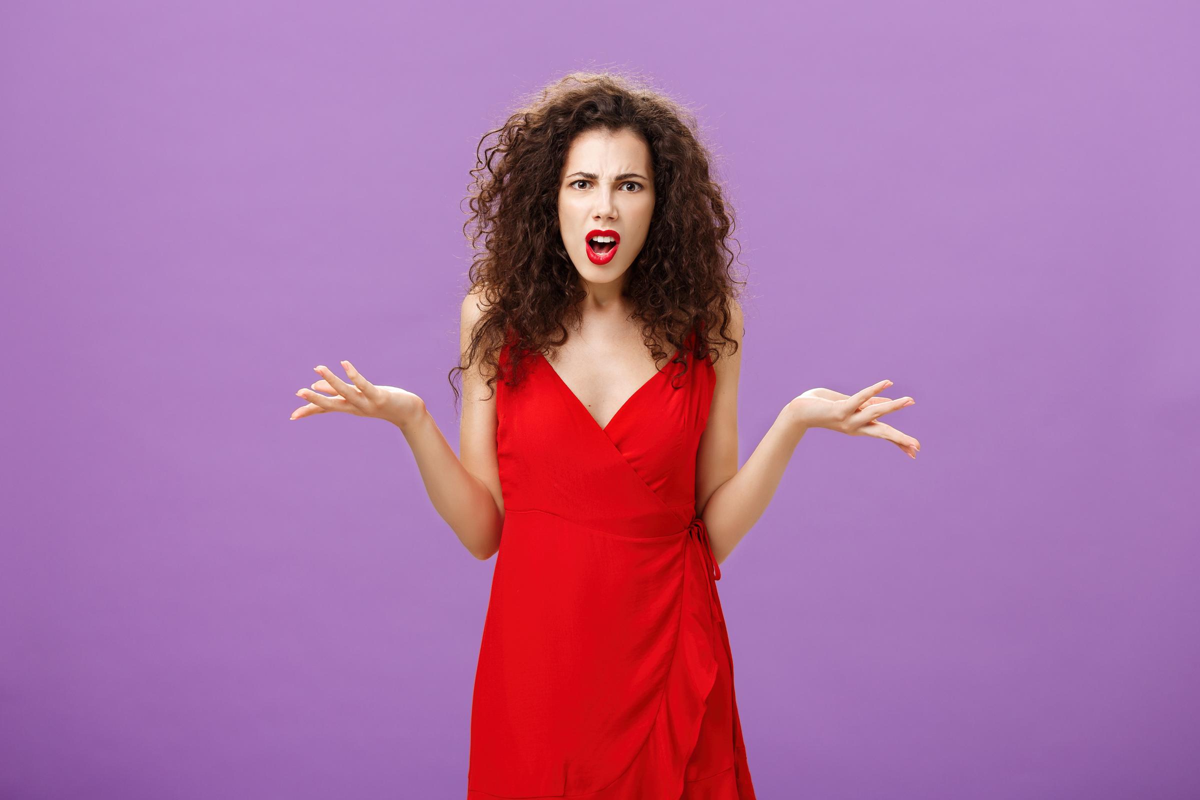 A shocked woman | Source: Freepik
