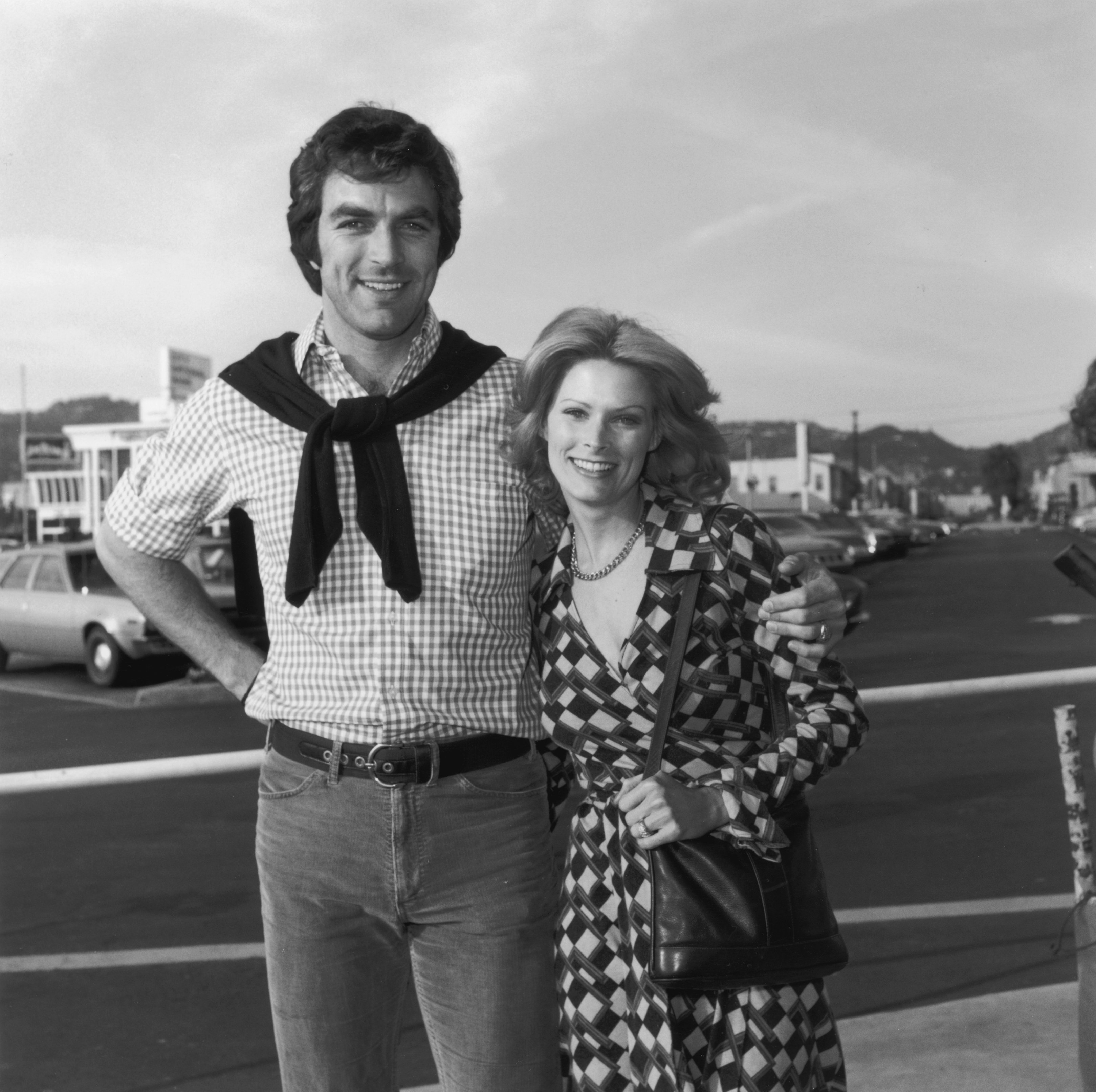 Tom Selleck poses outdoors with his first wife, actor Jacquelyn Ray, Los Angeles, California. | Source: Getty Images 