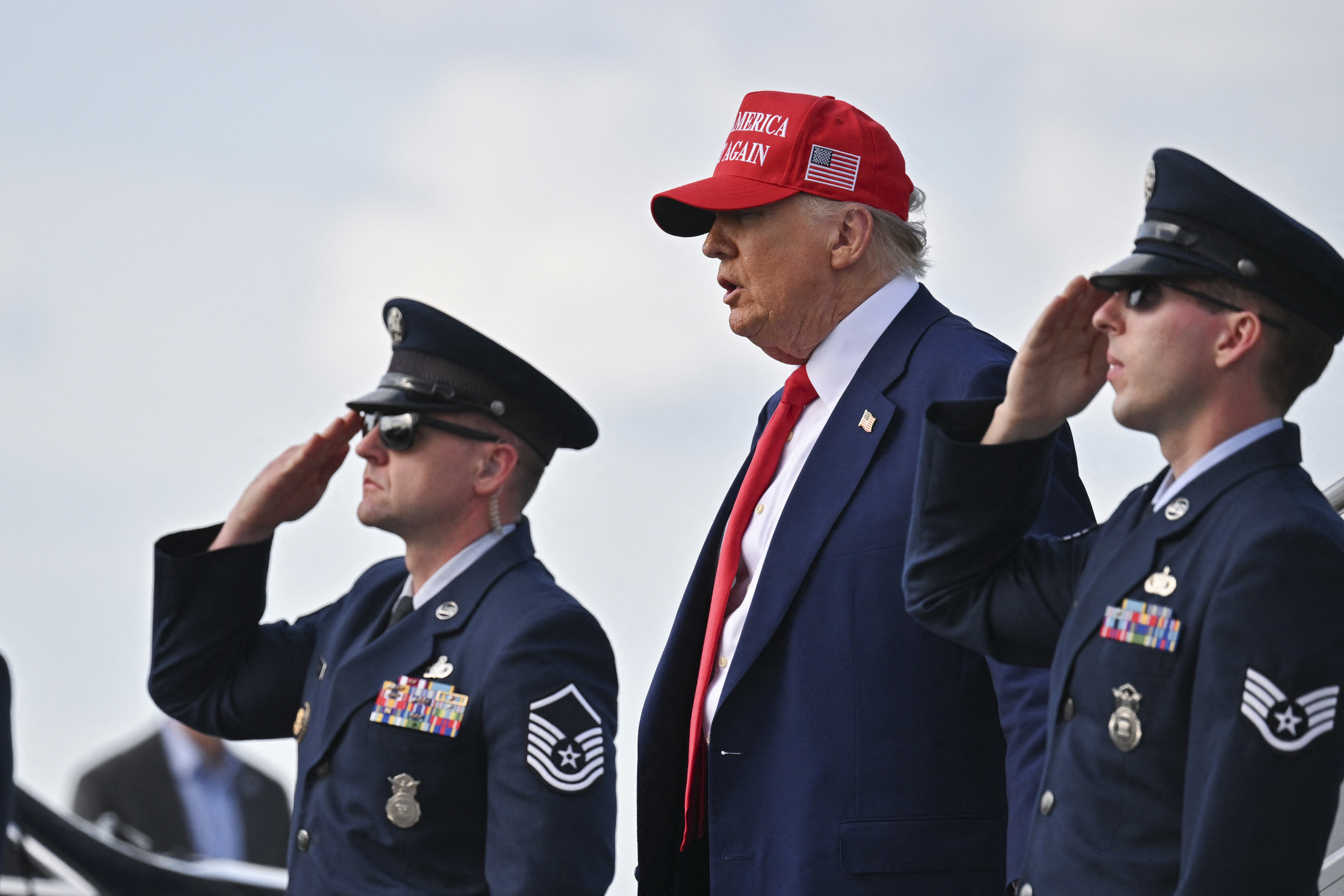 Donald Trump stepping off Air Force One after landing at the Palm Beach International Airport on February 16, 2025 | Source: Getty Images