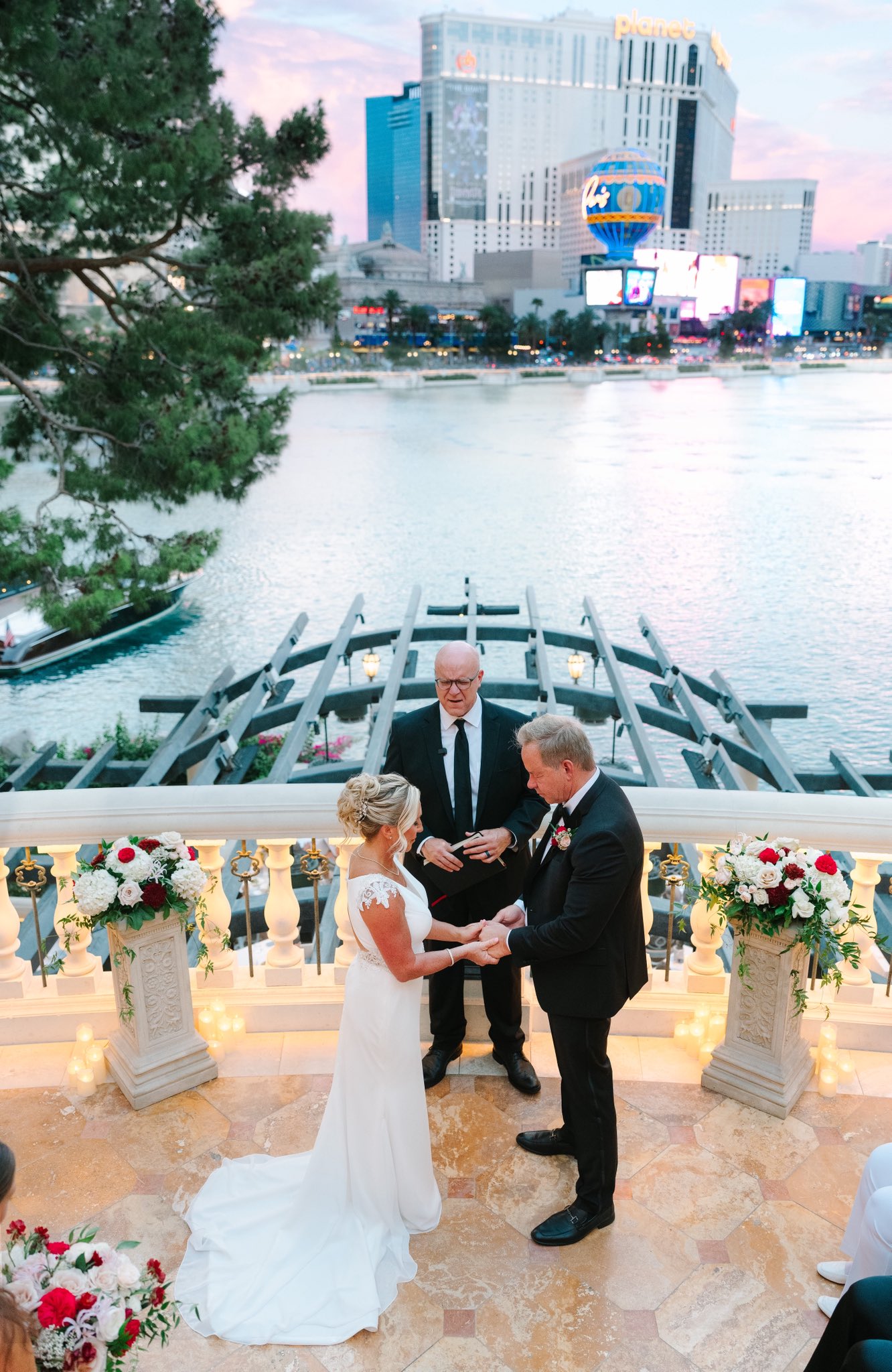 Overlooking the serene waters of the Bellagio, Greene and Glenn held hands as they officially exchanged their vows. The picturesque open-air terrace set the perfect intimate stage for their romantic Sin City ceremony. | Source: X/mtgreenee