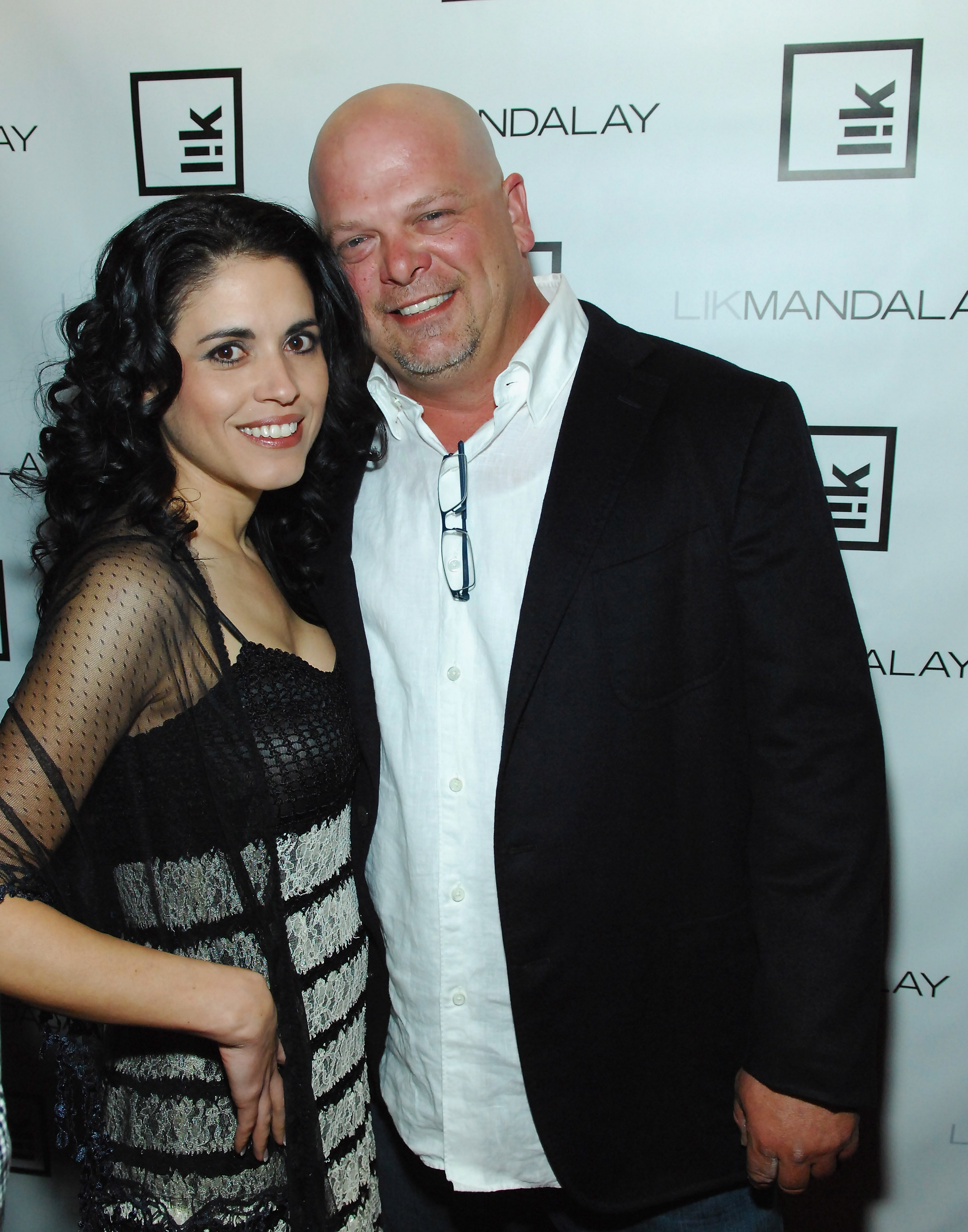 Rick Harrison and Deanna Burditt at the opening of Peter Lik's new gallery on February 25, 2012, in Las Vegas, Nevada. | Source: Getty Images