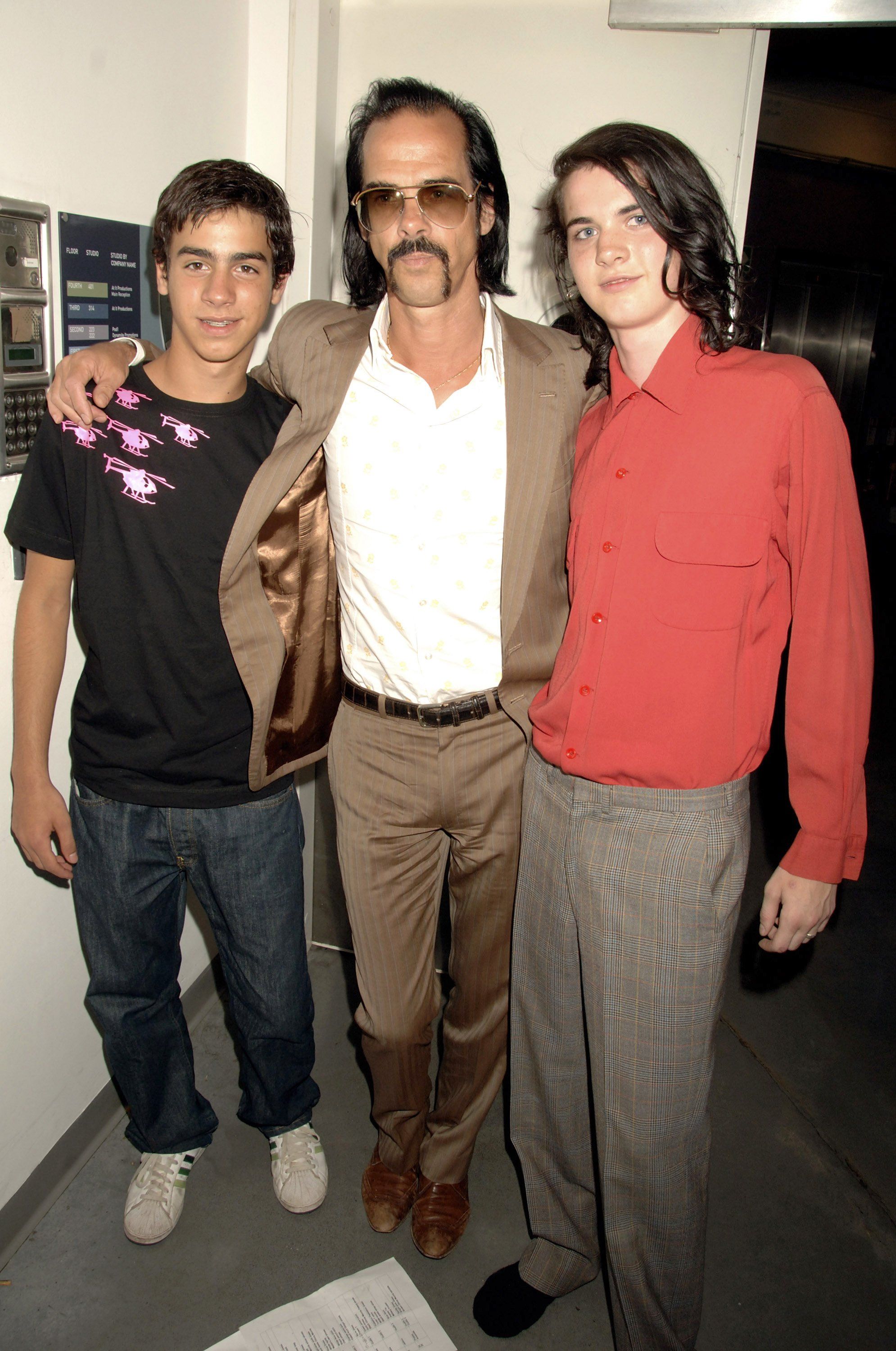 Nick Cave, Luke Cave, and Jethro Cave during the fashion show at Portobello Film Festival curated by Bella Freud with clothes from Portobello Market, at Westbourne Studios on August 3, 2006 in London, England. | Source: Getty Images