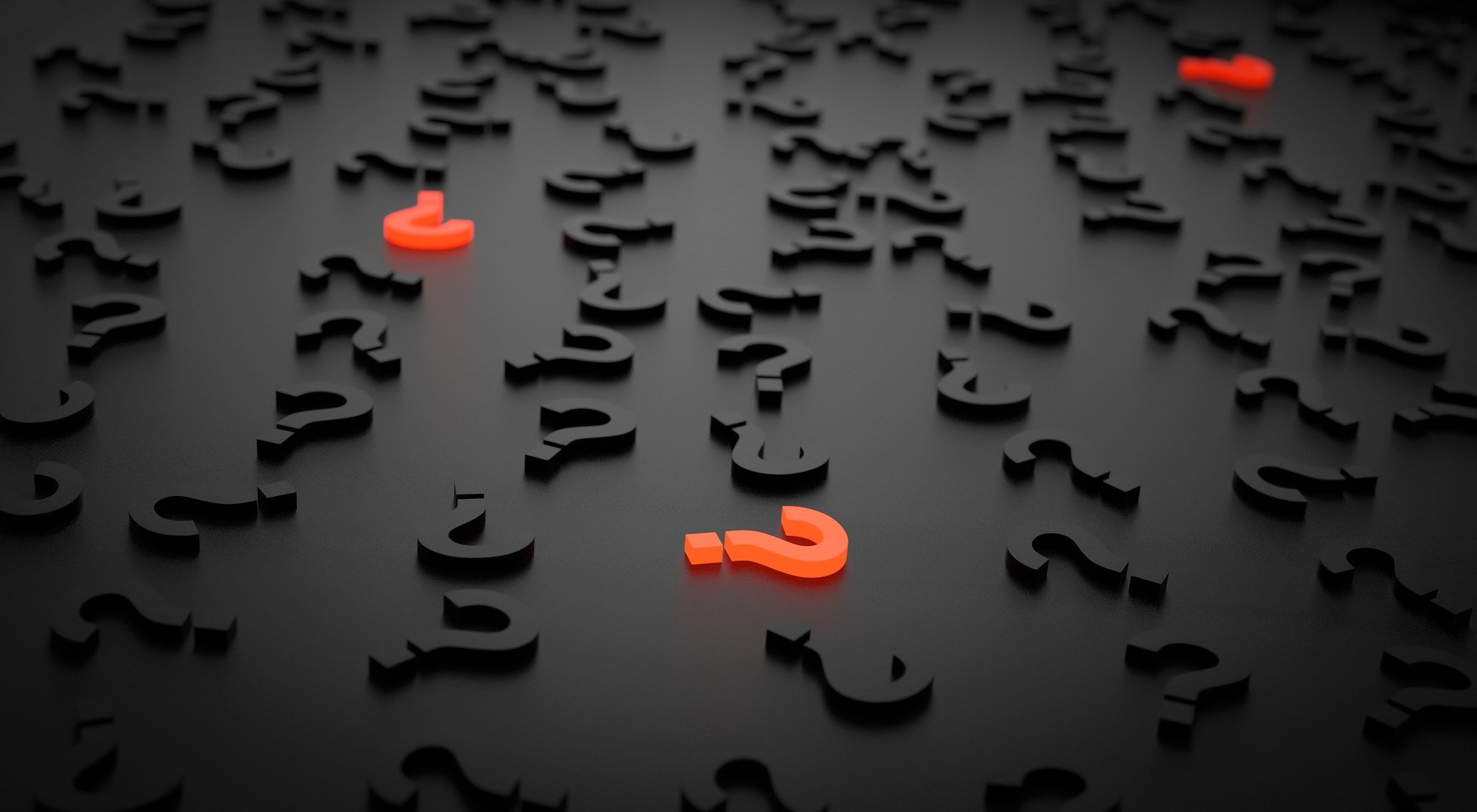 Black question marks are scattered with a few red questions in between. | Photo: Pixabay.com/Arek Socha