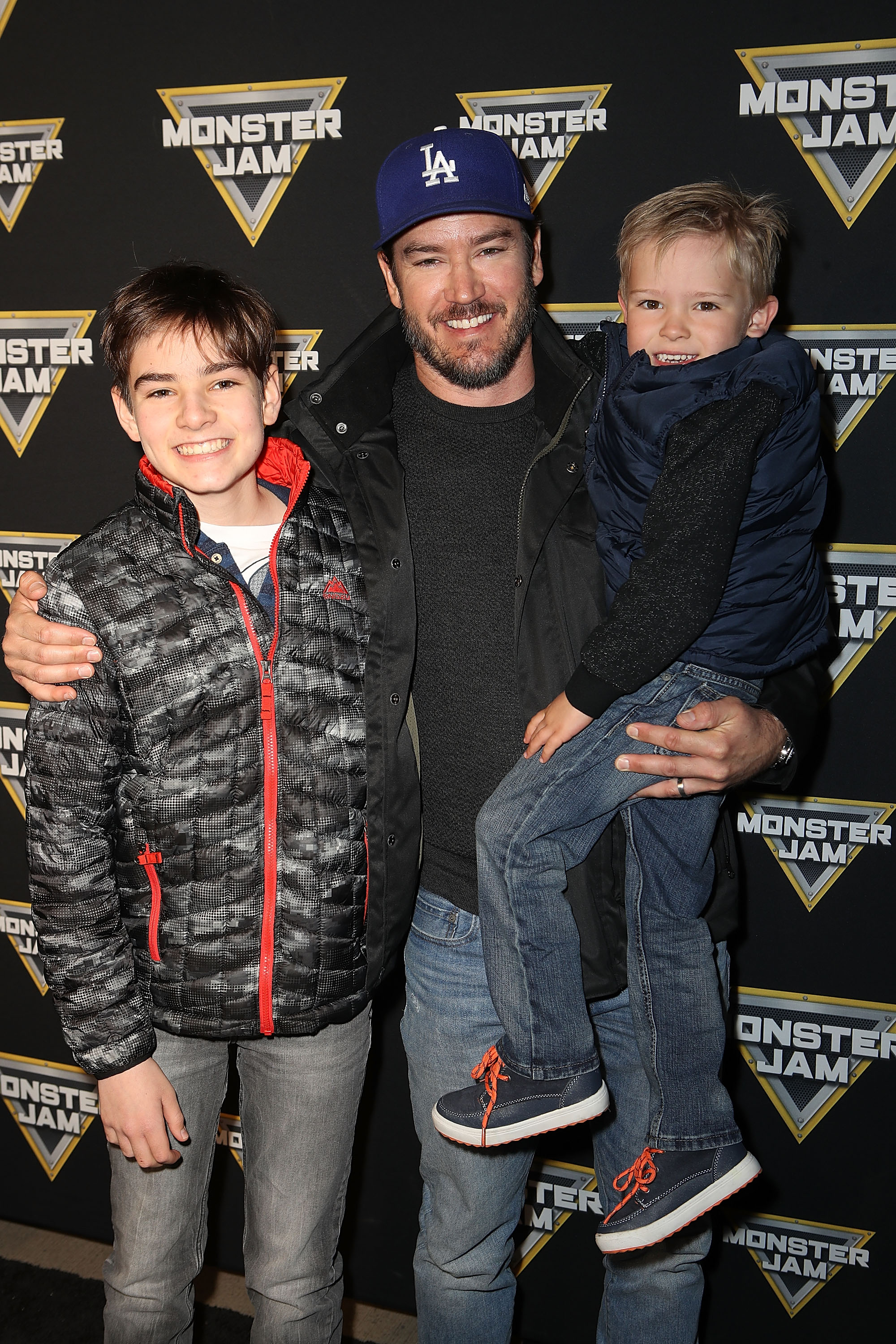 Mark-Paul Gosselaar and his sons Michael and Dekker arrive at Monster Jam Celebrity Event on February 24, 2018 | Source: Getty Images