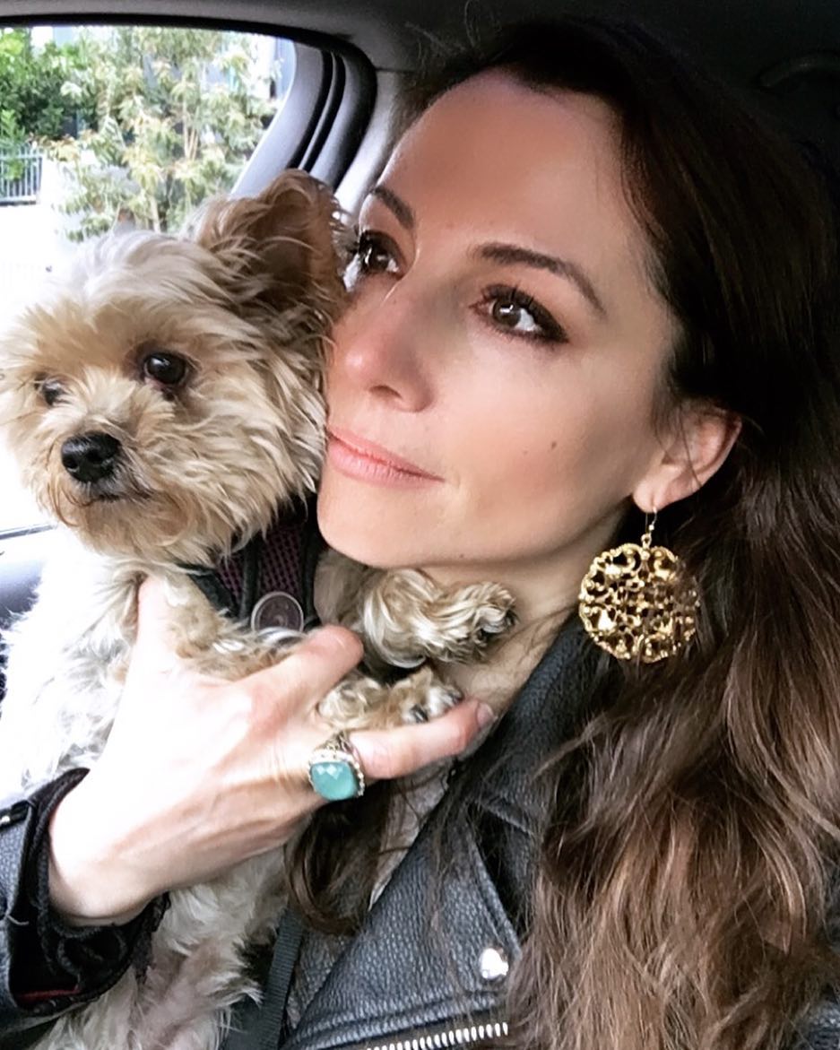 Heather McComb posing for a selfie with her dog, posted on November 3, 2018. | Source: Instagram/heatmccomb