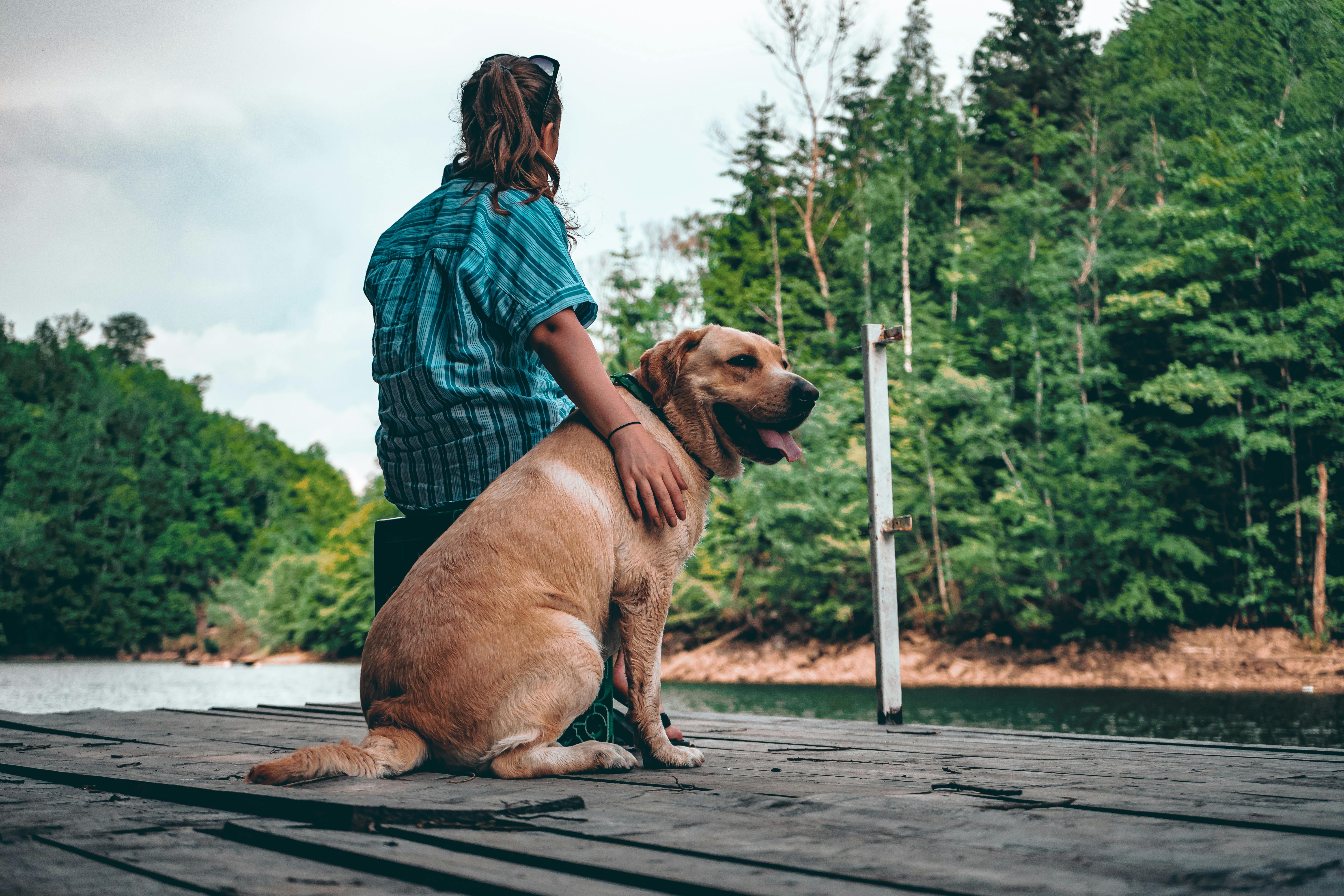 a woman with her dog | Source: Pexels