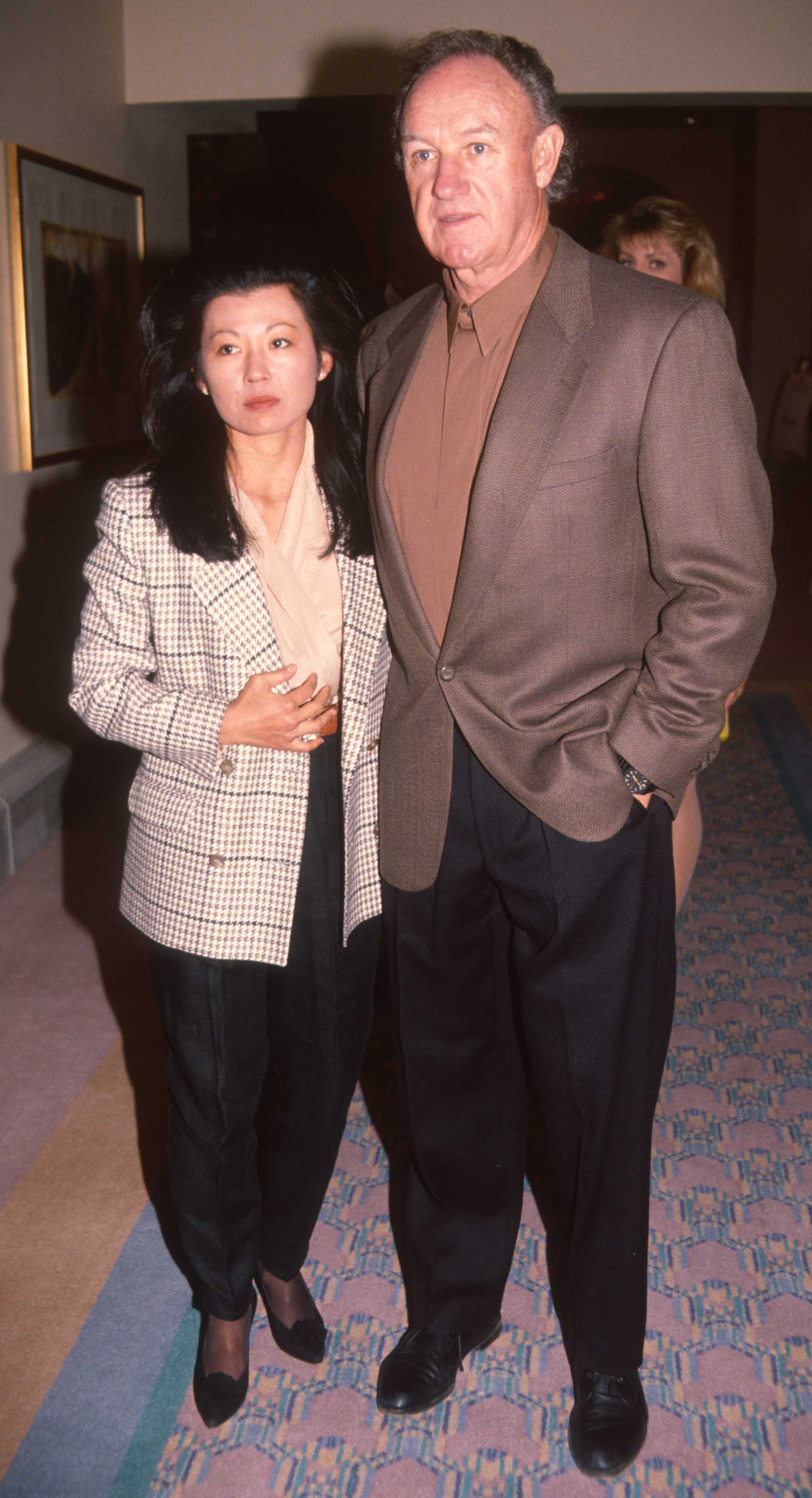 Betsy Arakawa and actor Gene Hackman attend the Mission Hills Celebrity Sports Invitational, Rancho Mirage, California, on November 29, 1991 | Source: Getty Images