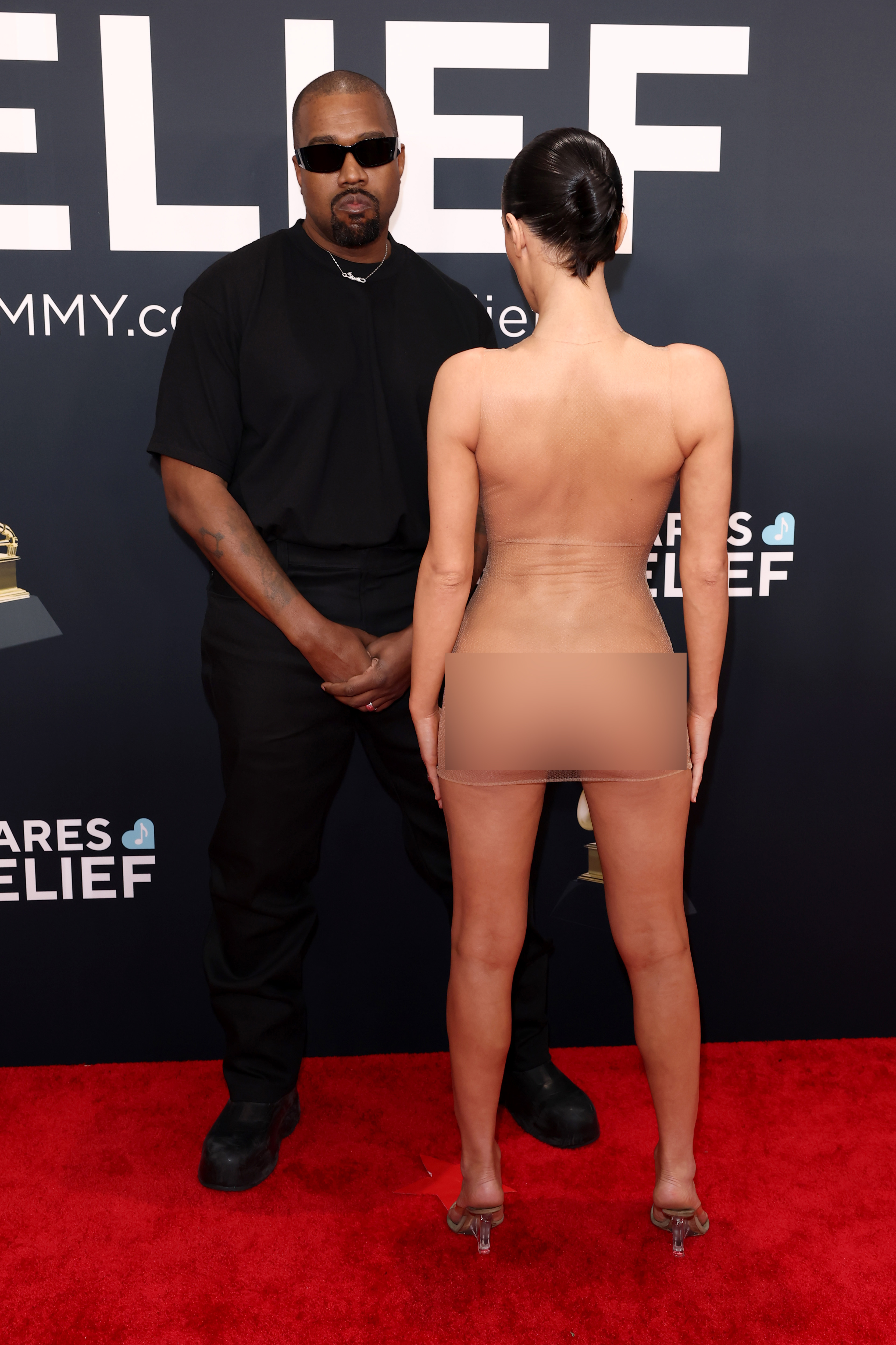 Kanye West and Bianca Censori (whose outfit has been blurred) attend the 67th GRAMMY Awards on February 2, 2025, in Los Angeles, California | Source: Getty Images