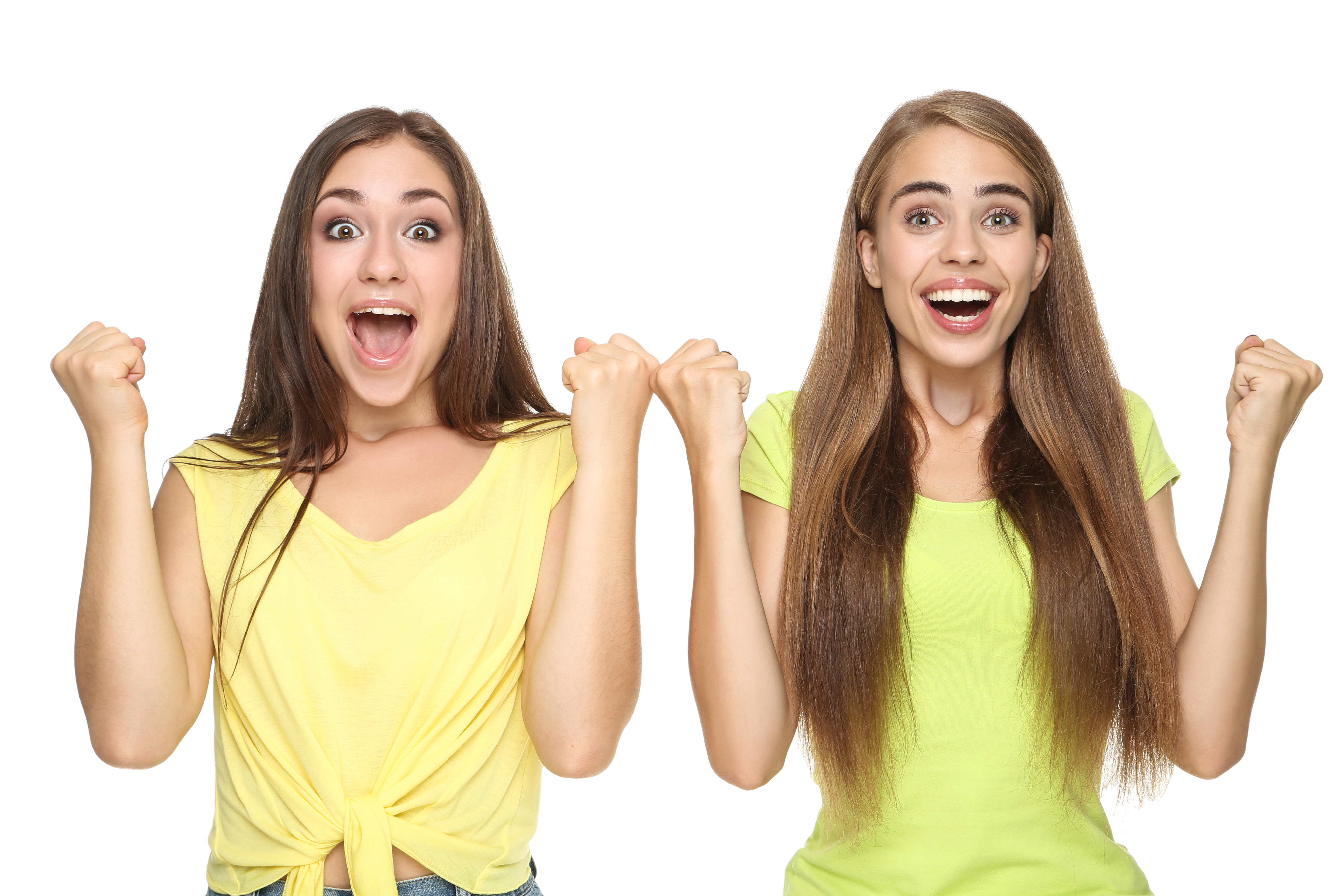 Two girls looking ecstatic | Source: Shutterstock