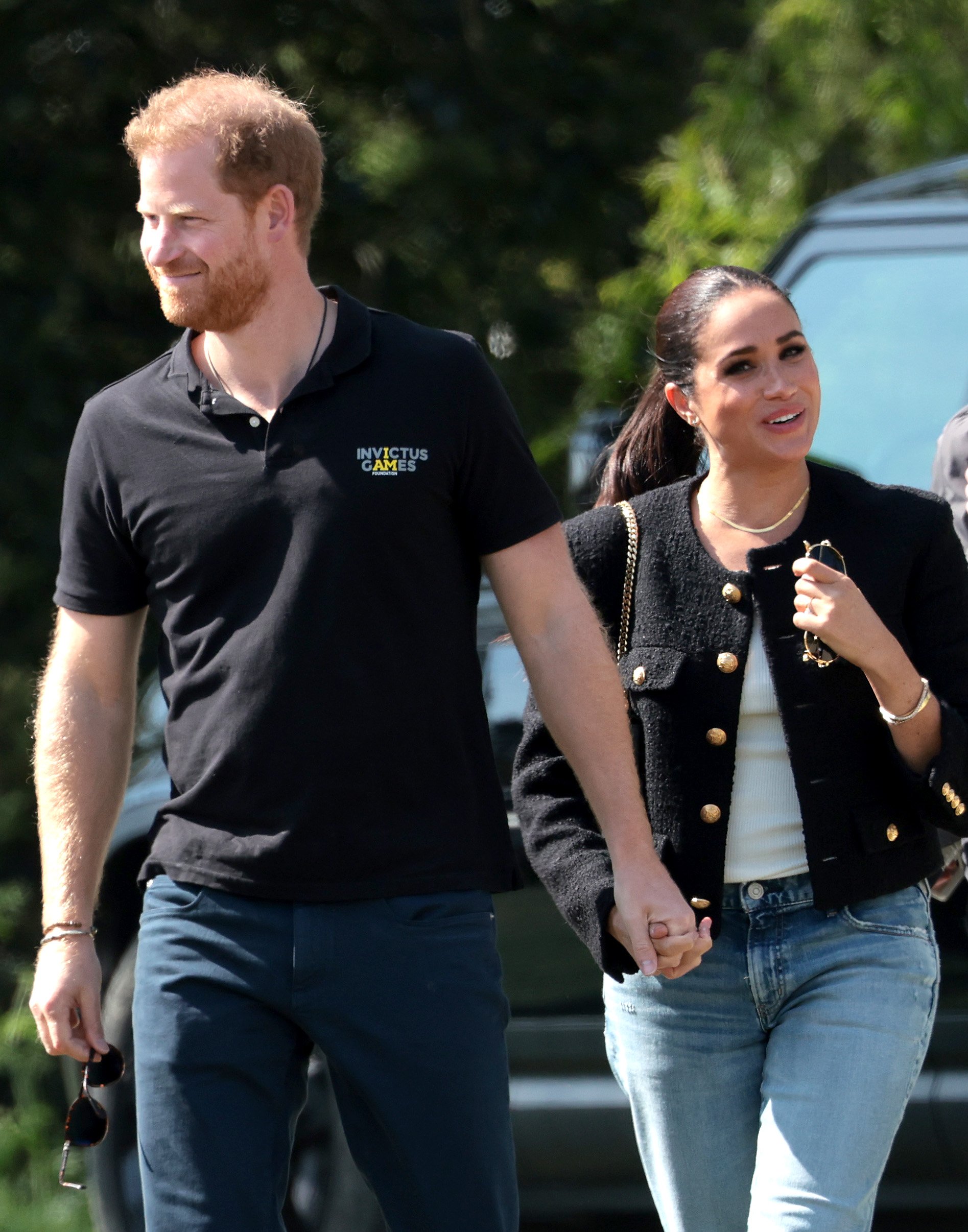 Meghan Markle and her husband Prince Harry attending the Jaguar Land Rover Driving Challenge on day one of the Invictus Games The Hague 2020 at Zuiderpark on April 16, 2022 in The Hague, Netherlands. / Source: Getty Images
