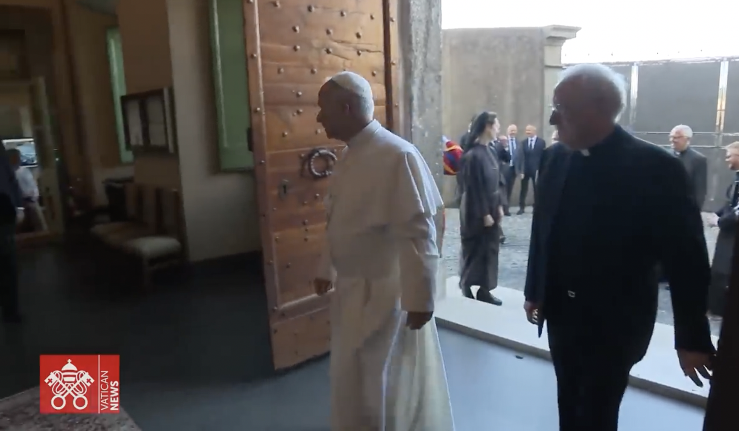 Pope Leo XIV enters Villa Barberini with another official at Castel Gandolfo, dated July 2025 | Source: YouTube/VaticanNews