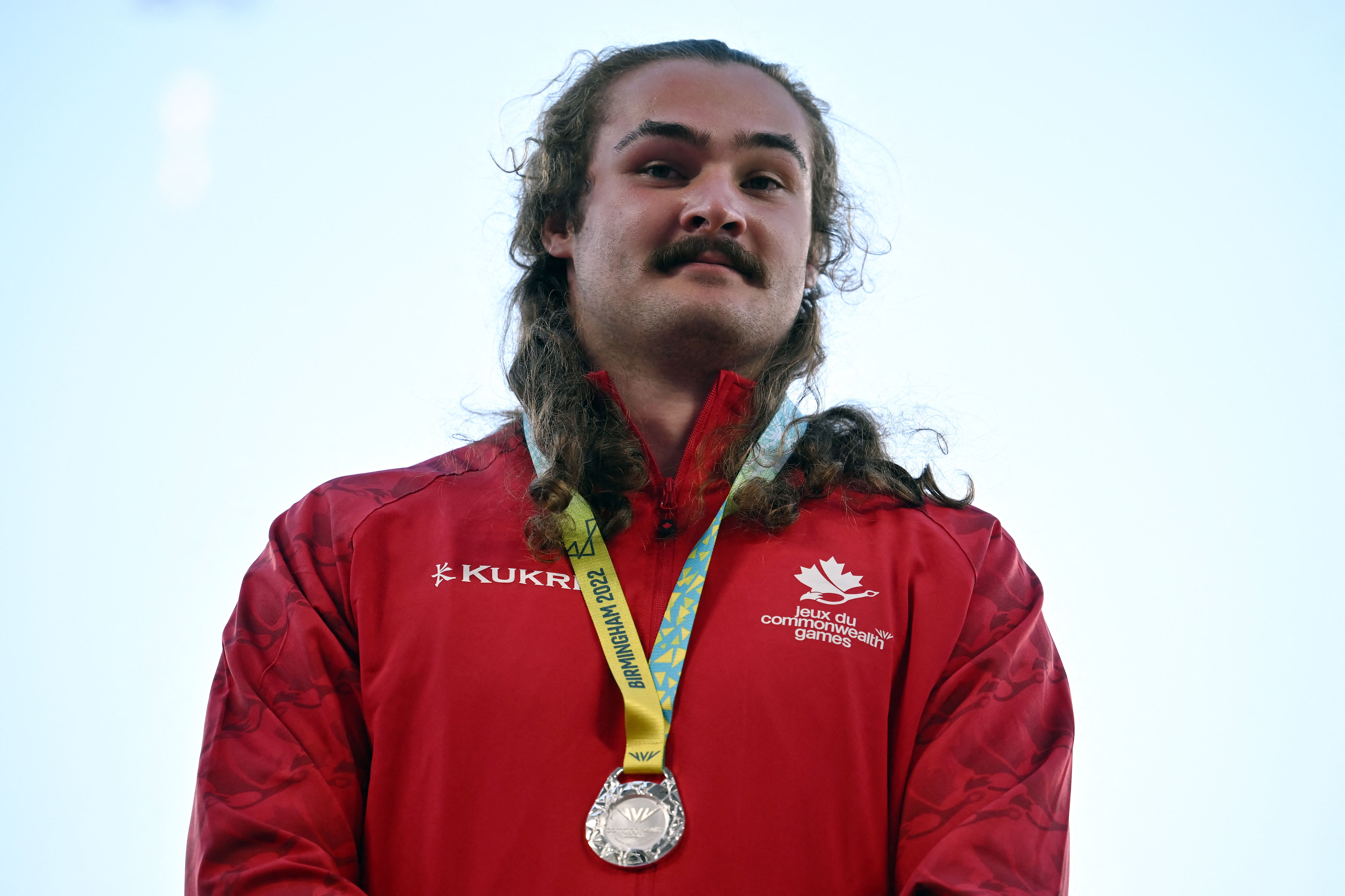 Ethan Katzberg pose during the medal ceremony on day nine of the Commonwealth Games in Birmingham, central England, on August 6, 2022. | Source: Getty Images