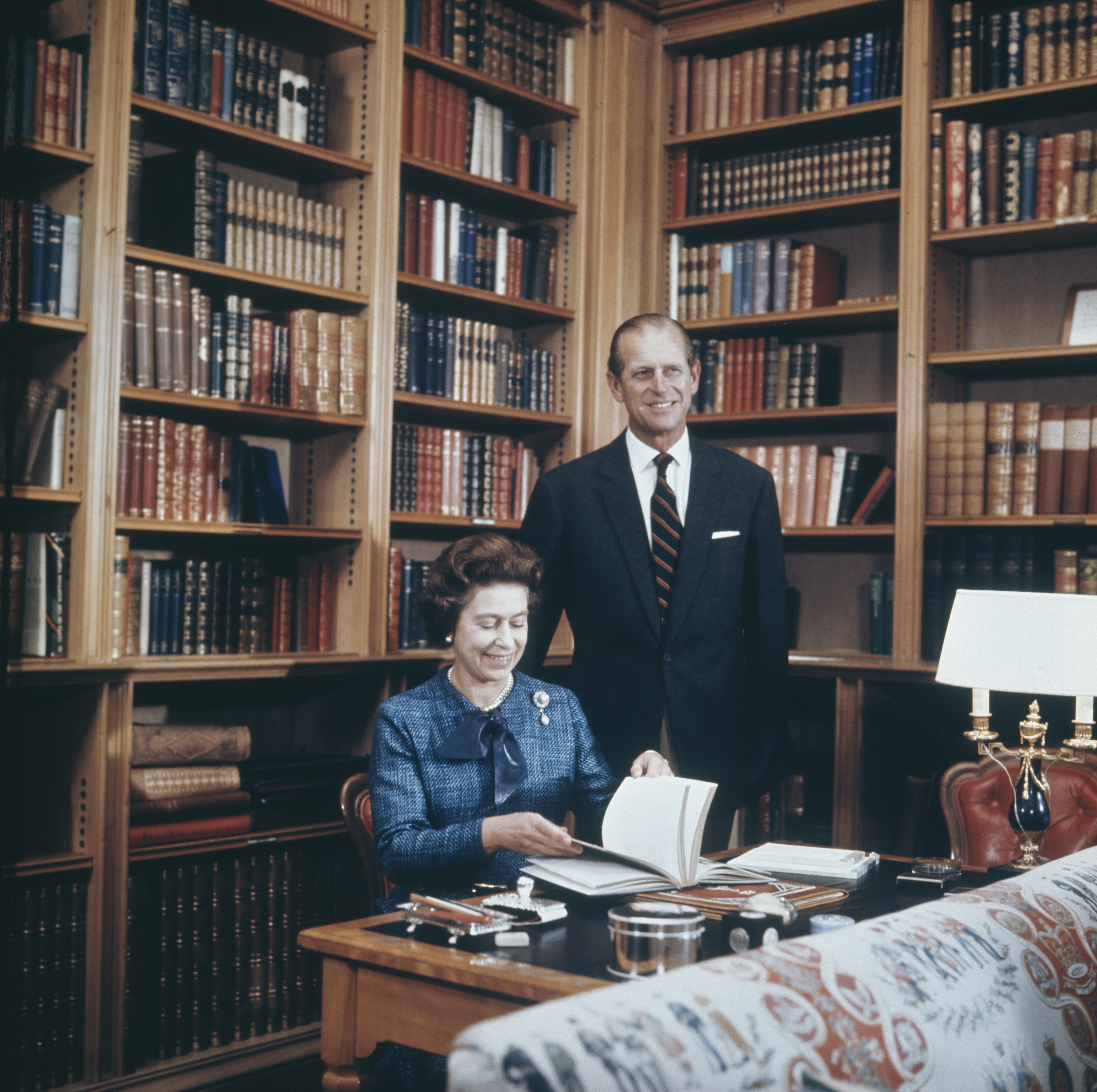 Queen Elizabeth II and Prince Philip in the study at Balmoral Castle, Scotland, on September 26, 1976 | Source: Getty Images