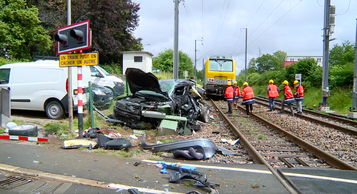 Screenshot of video showing the car crumpled after it crashed with the train. | Source: RTL Today