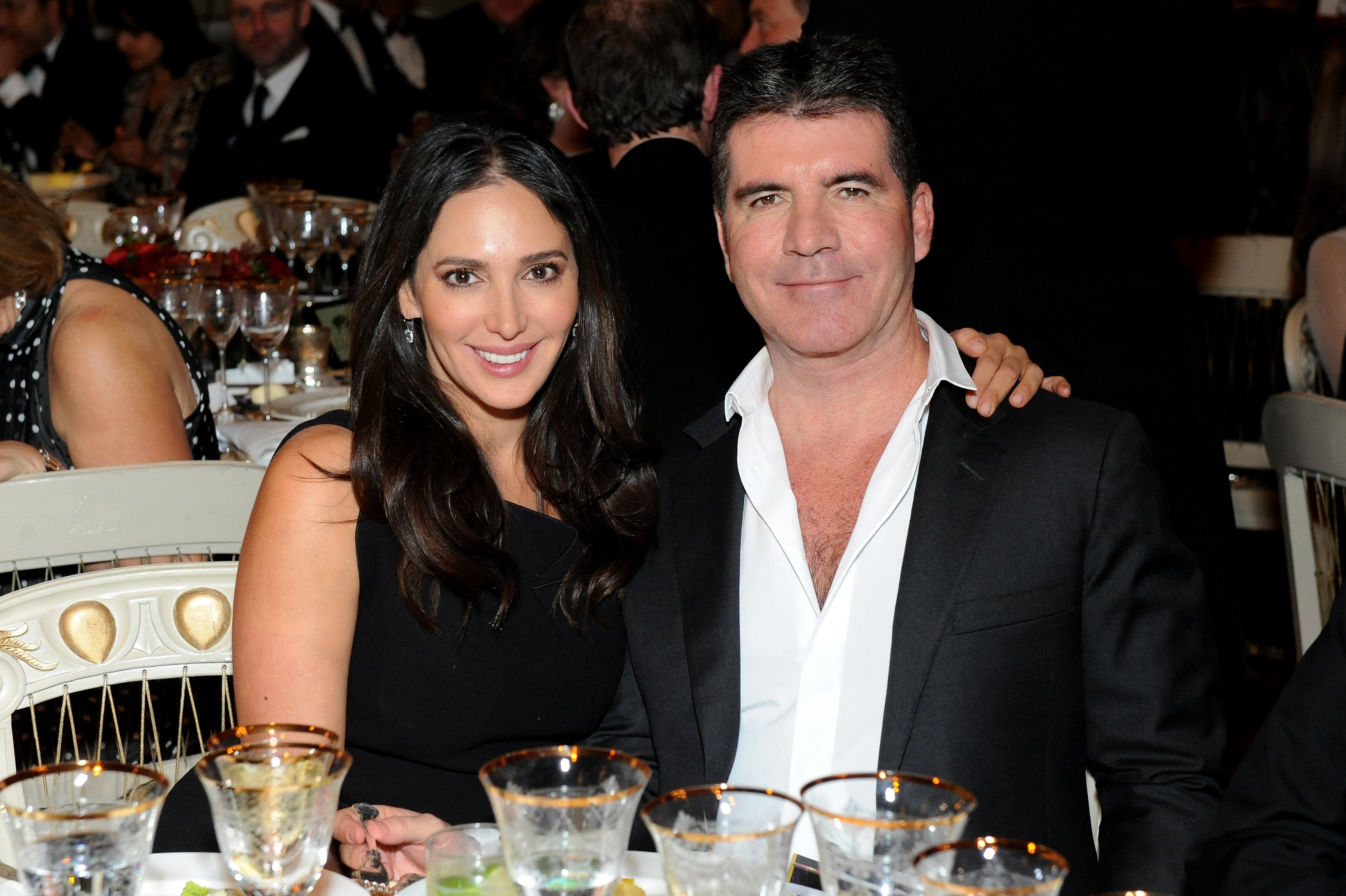 Simon Cowell and Lauren Silverman attend the British Asian Trust dinner at Banqueting House on February 3, 2015 in London, England | Source: Getty Images 