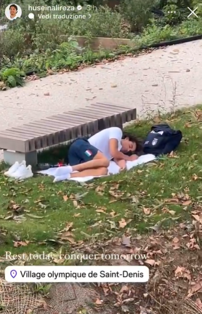 Thomas Ceccon sleeps peacefully under a tree next to a park bench, shared by Saudie Arabian rower Husein Alireza on Instagram Story on August 2024 | SOurce.