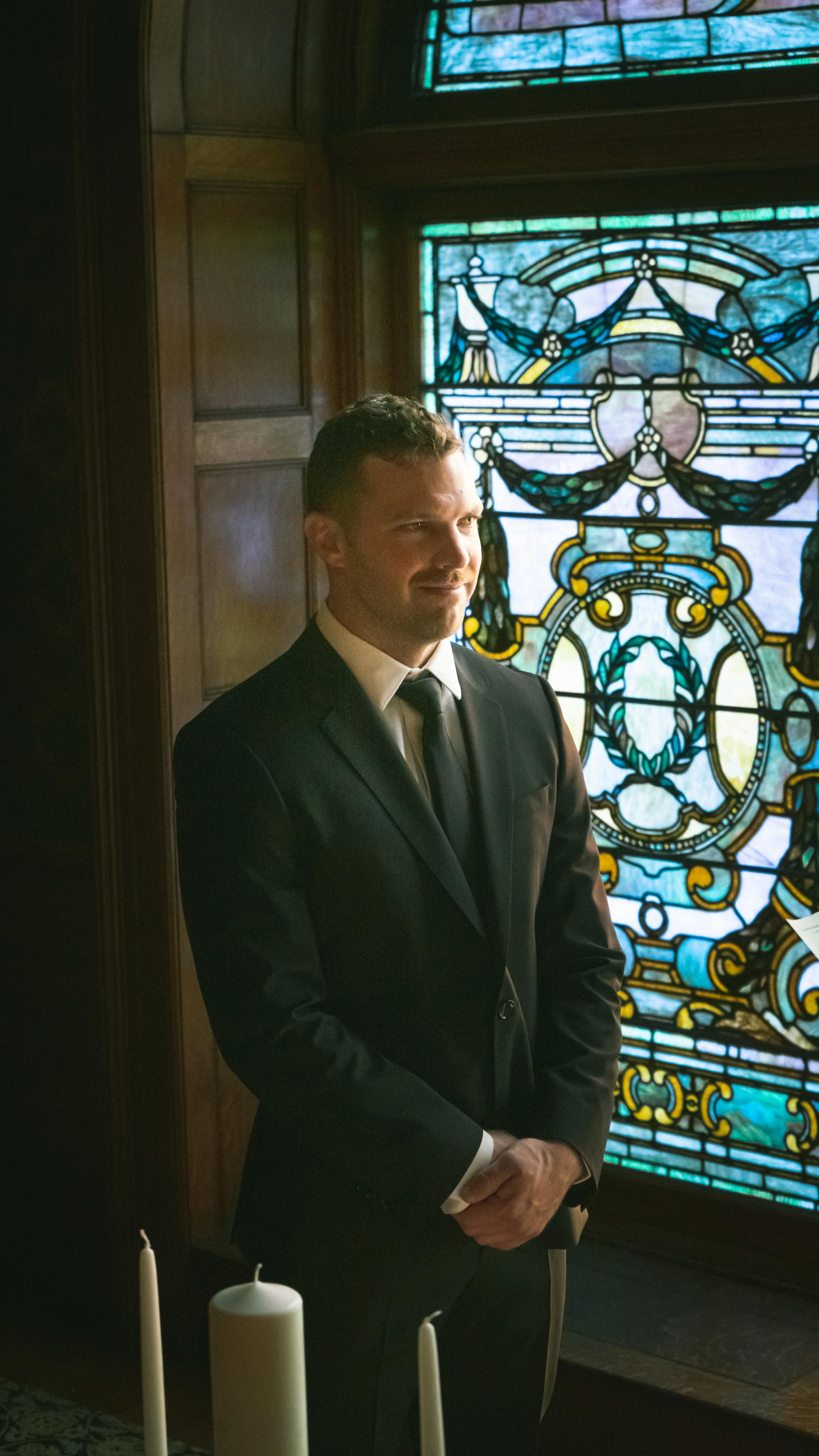 A groom standing at the altar in a church | Source: Pexels