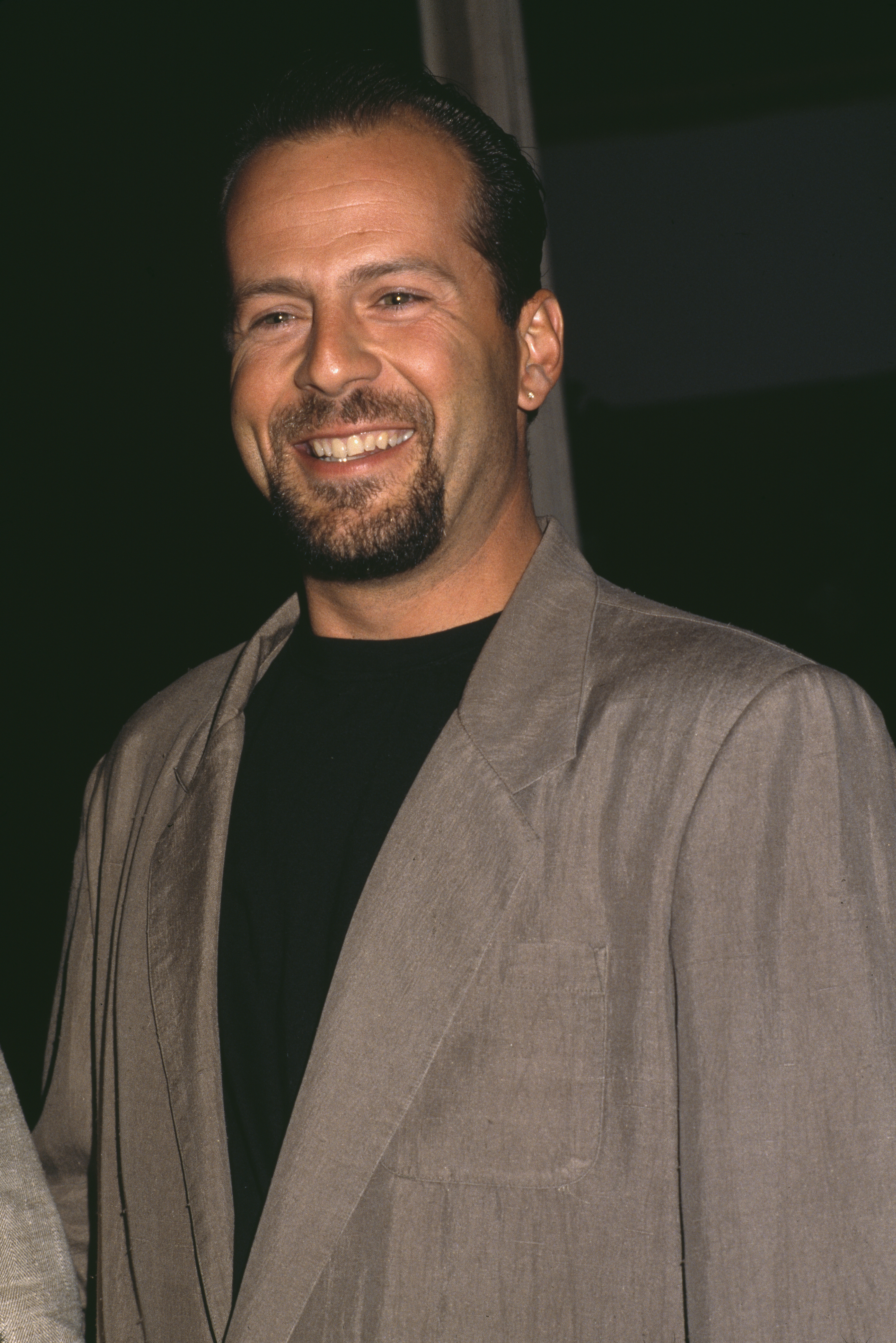 Bruce Willis, sporting a goatee at an unspecified event around 1990 | Source: Getty Images