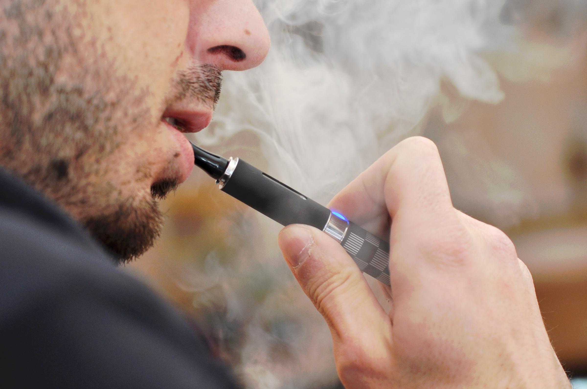 A man smoking a vape | Source: Getty Images