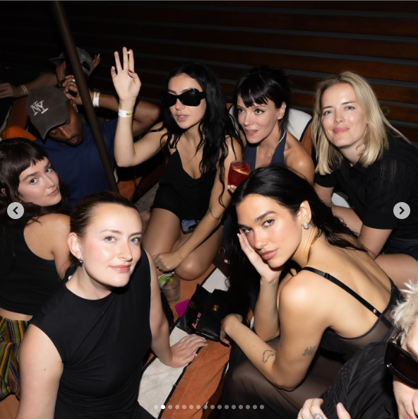 Dua Lipa in a see-through dress, and friends celebrating following her performance at Wembley Stadium posted on June 22, 2025 | Source: Instagram/dualipa