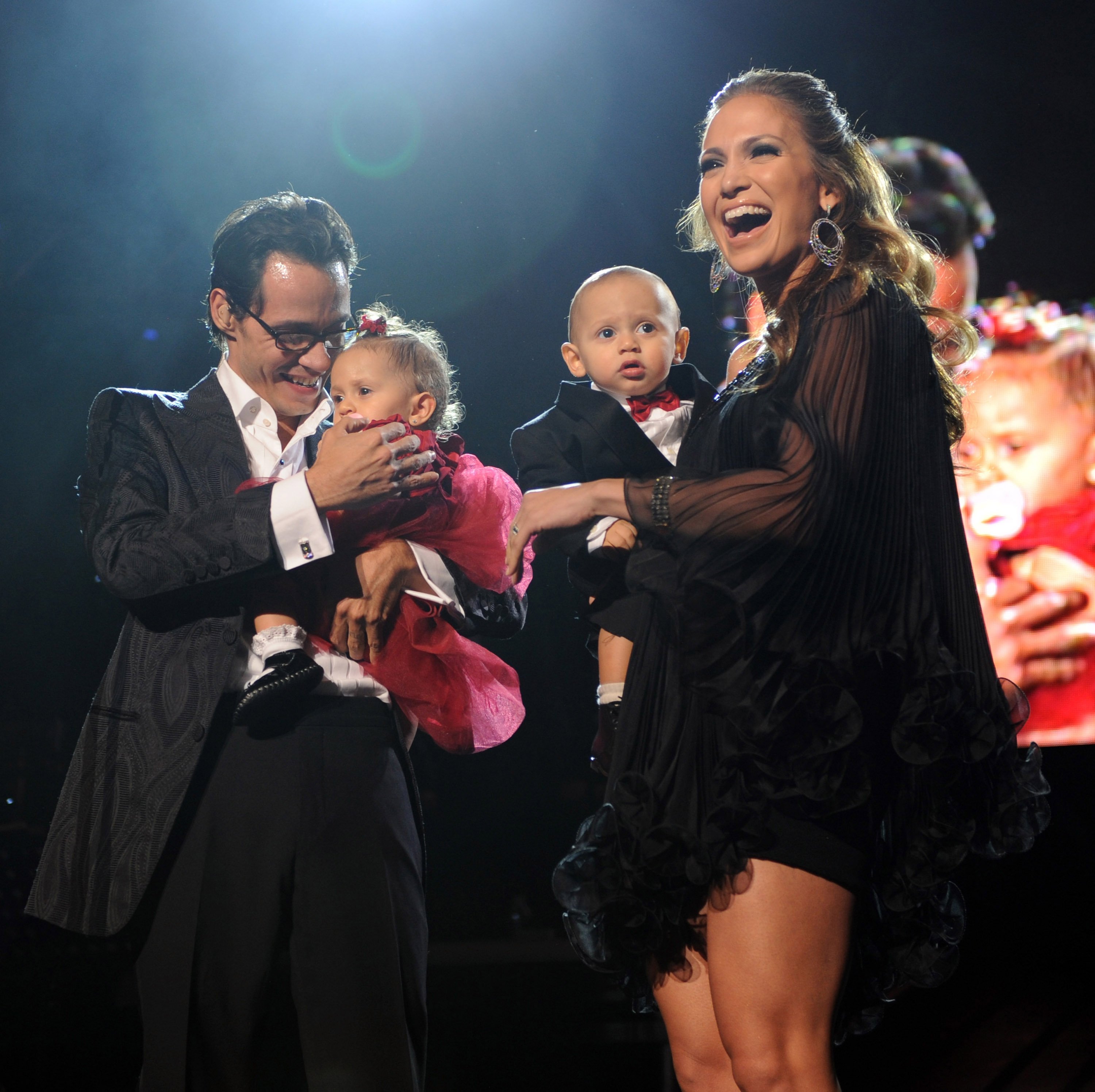 Marc Anthony, Jennifer Lopez pictured with their kids Max and Emme on stage at Madison Square Garden on February 14, 2009 in New York City. / Source: Getty Images