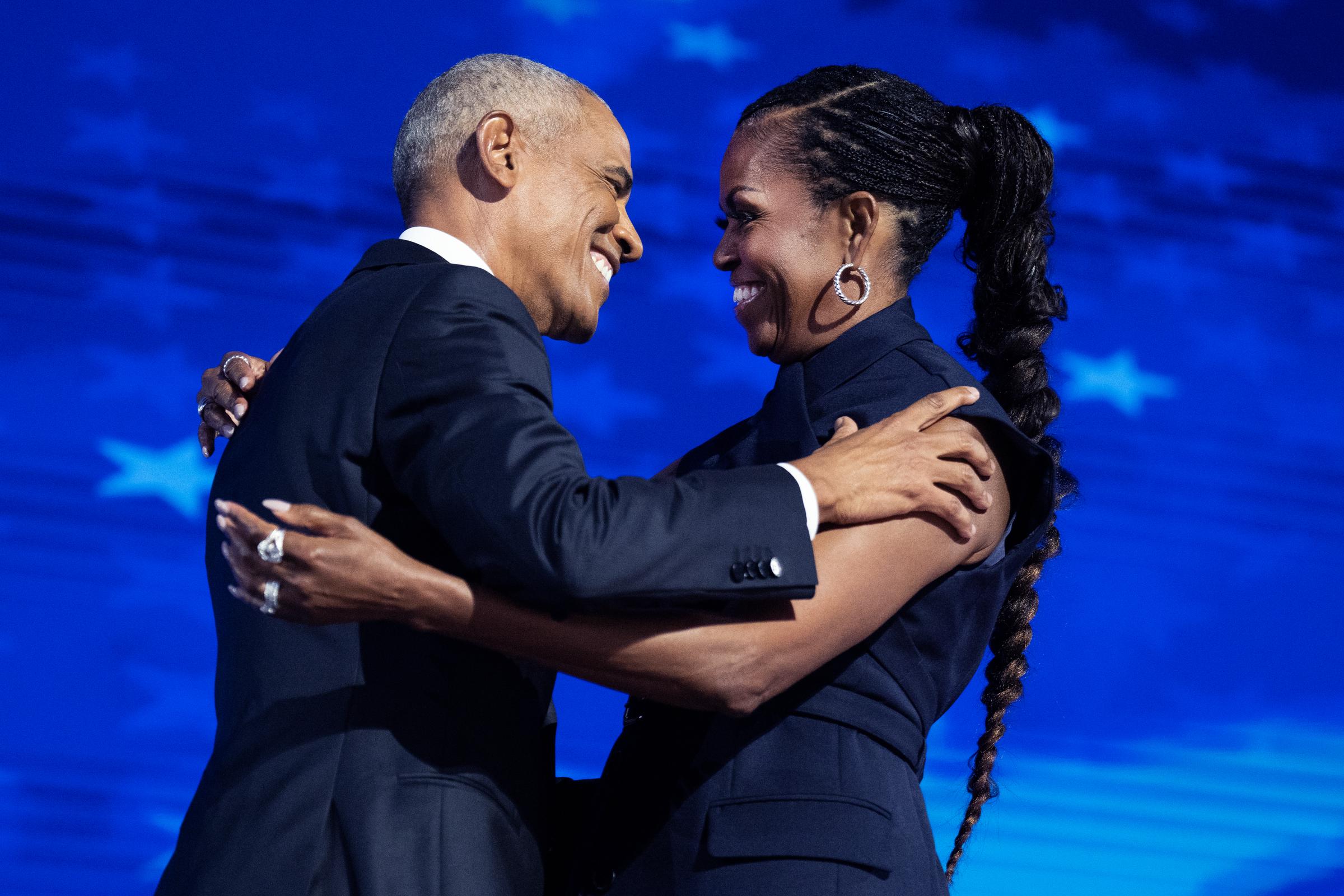 Former President Barack Obama and former First Lady Michelle Obama on stage on the second night of the Democratic National Convention in Chicago, Illinois, on August 20, 2024 | Source: Getty Images