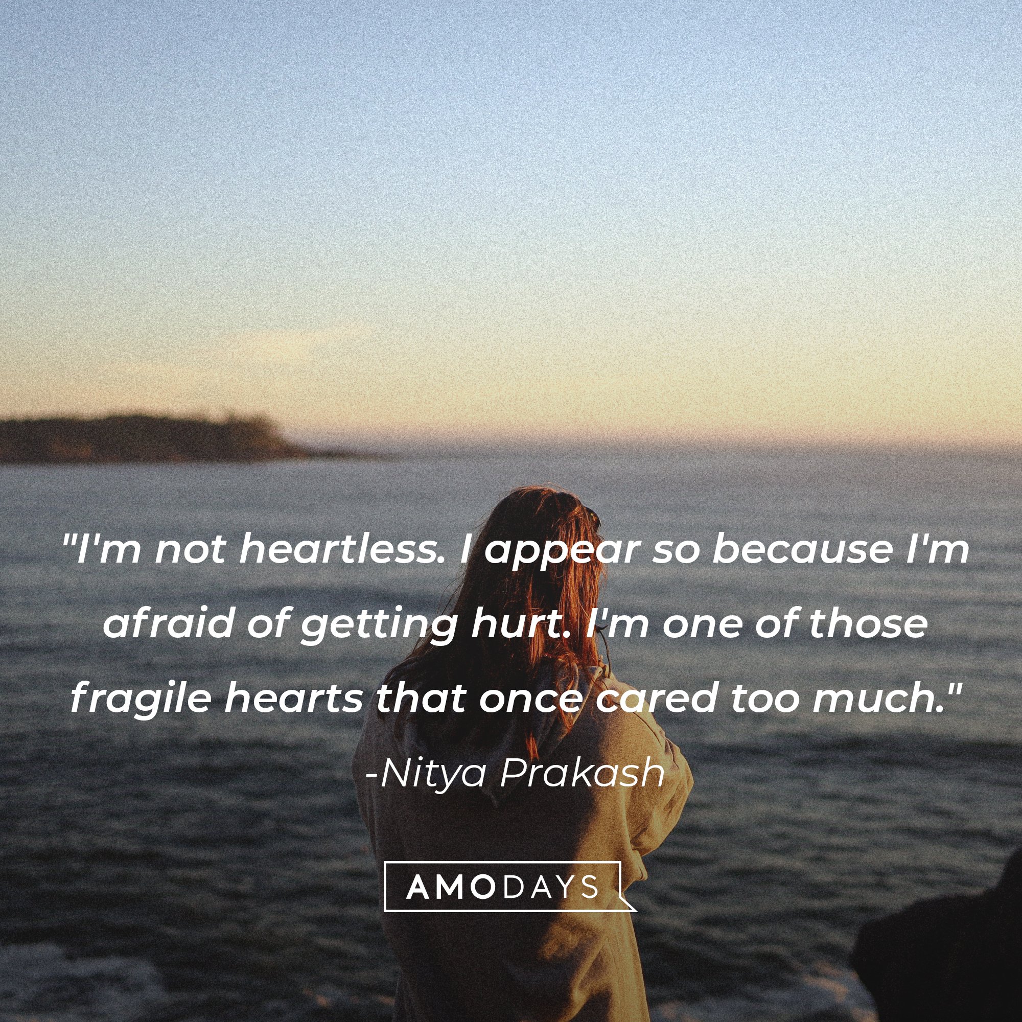 Nitya Prakash's quote: "I'm not heartless. I appear so because I'm afraid of getting hurt. I'm one of those fragile hearts that once cared too much." | Image: AmoDays