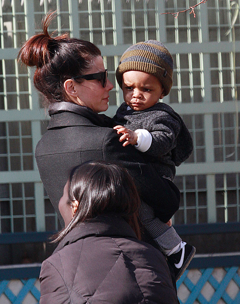 Sandra Bullock and her son Louis stroll through the streets of Manhattan on March 20, 2011, in New York City. | Source: Getty Images