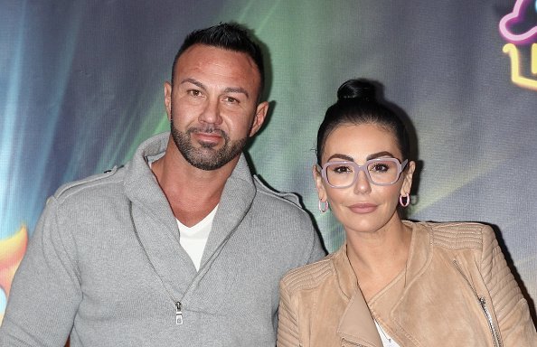 Roger Mathews and Jenni "JWoww" Farley at the Dreamworks Trolls The Experience opening in New York City.| Photo: Getty Images.