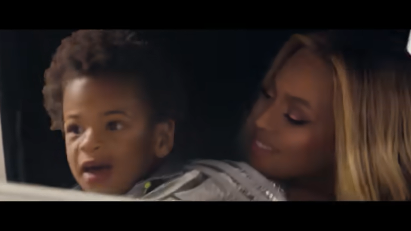 Sir Carter and Beyonce on a gold cart | Source: YouTube/Beyonce