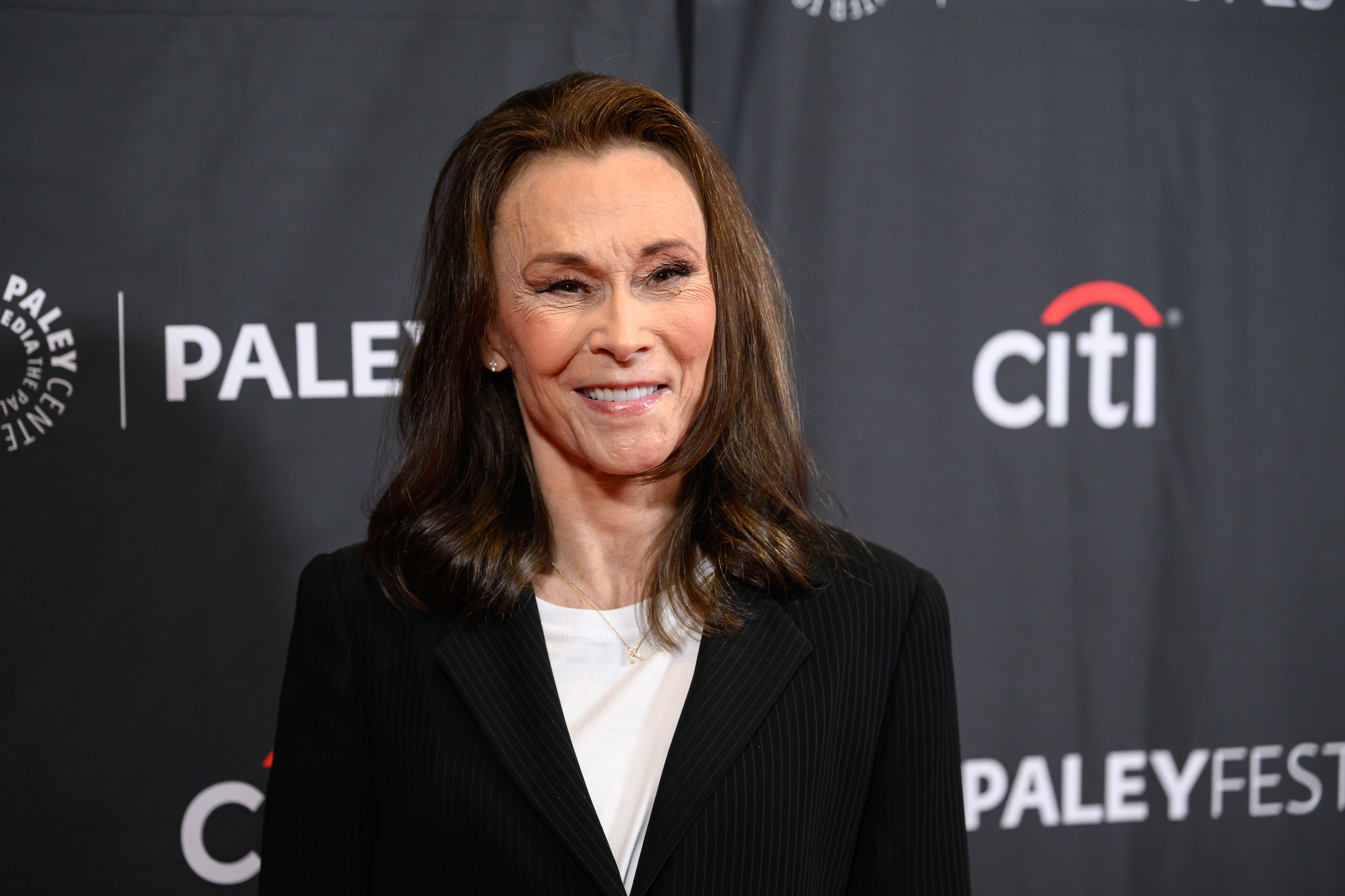 Kate Jackson turns slightly toward the cameras at PaleyFest LA, her composed expression and polished look capturing a candid red carpet moment.