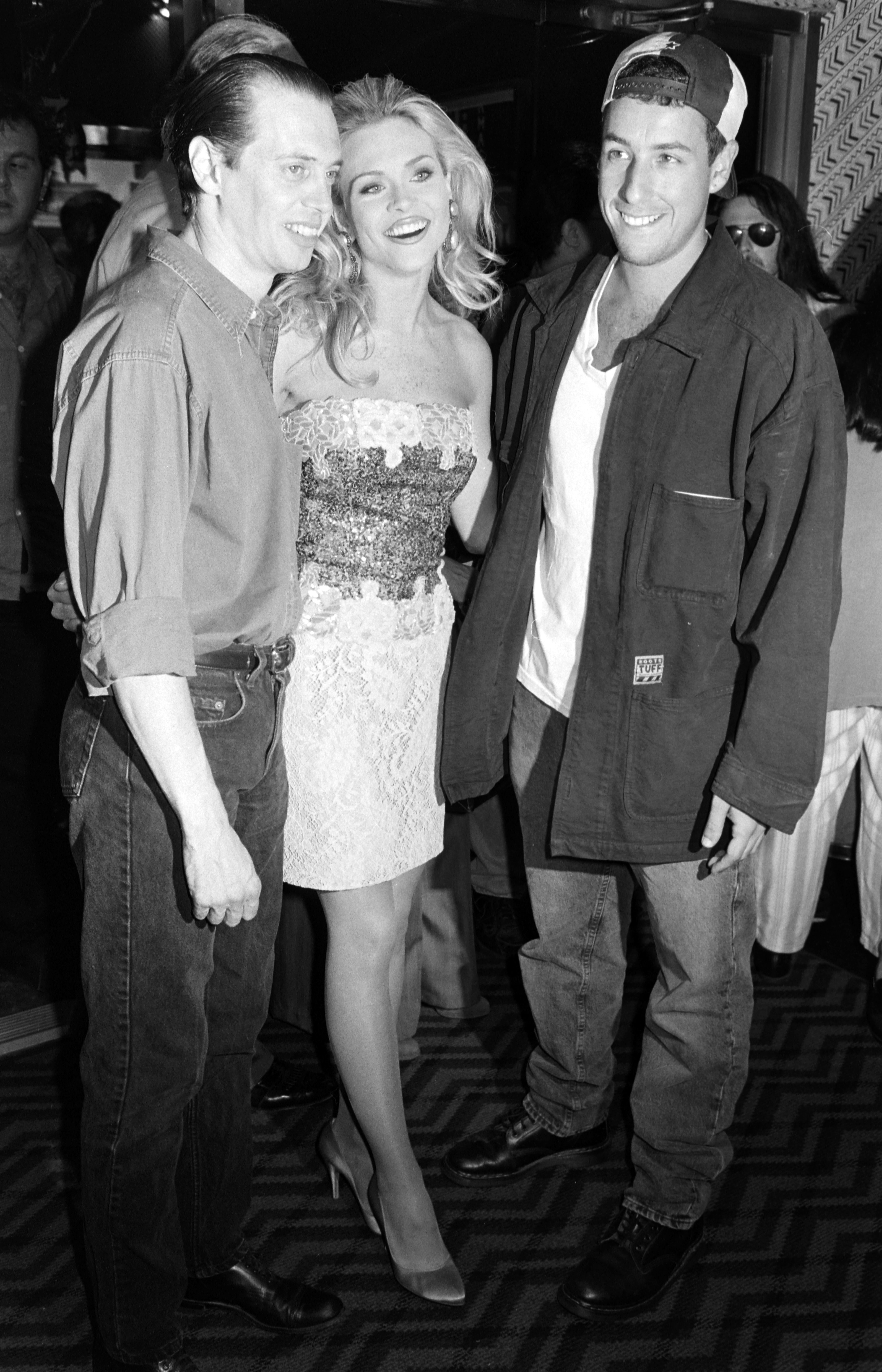 Steve Buscemi, Amy Locane, and Adam Sandler at the premiere of "Airheads" in New York City on August 1, 1994 | Source: Getty Images