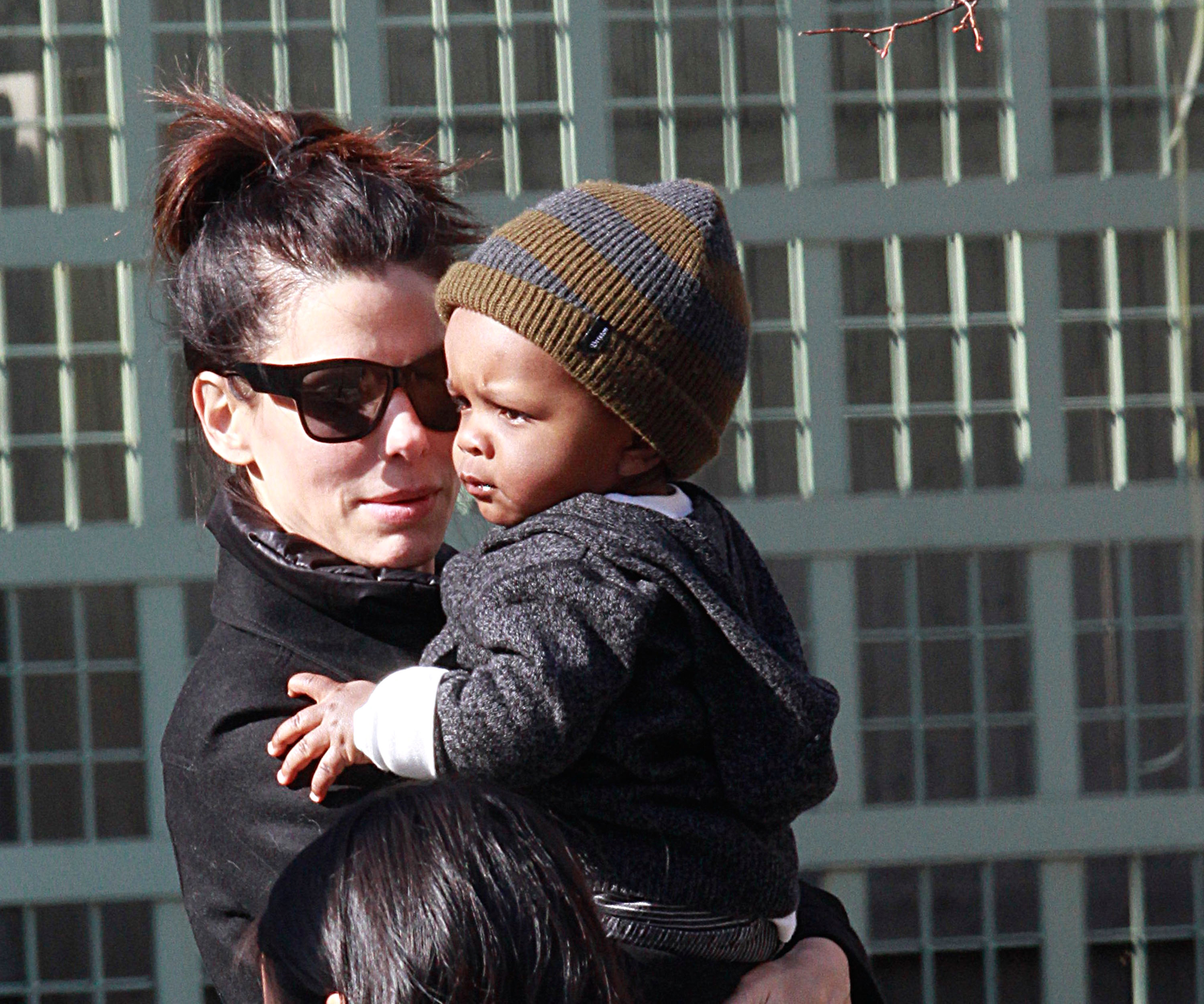 Sandra Bullock and her son Louis Bullock seen on the streets of Manhattan on March 20, 2011, in New York City | Source: Getty Images