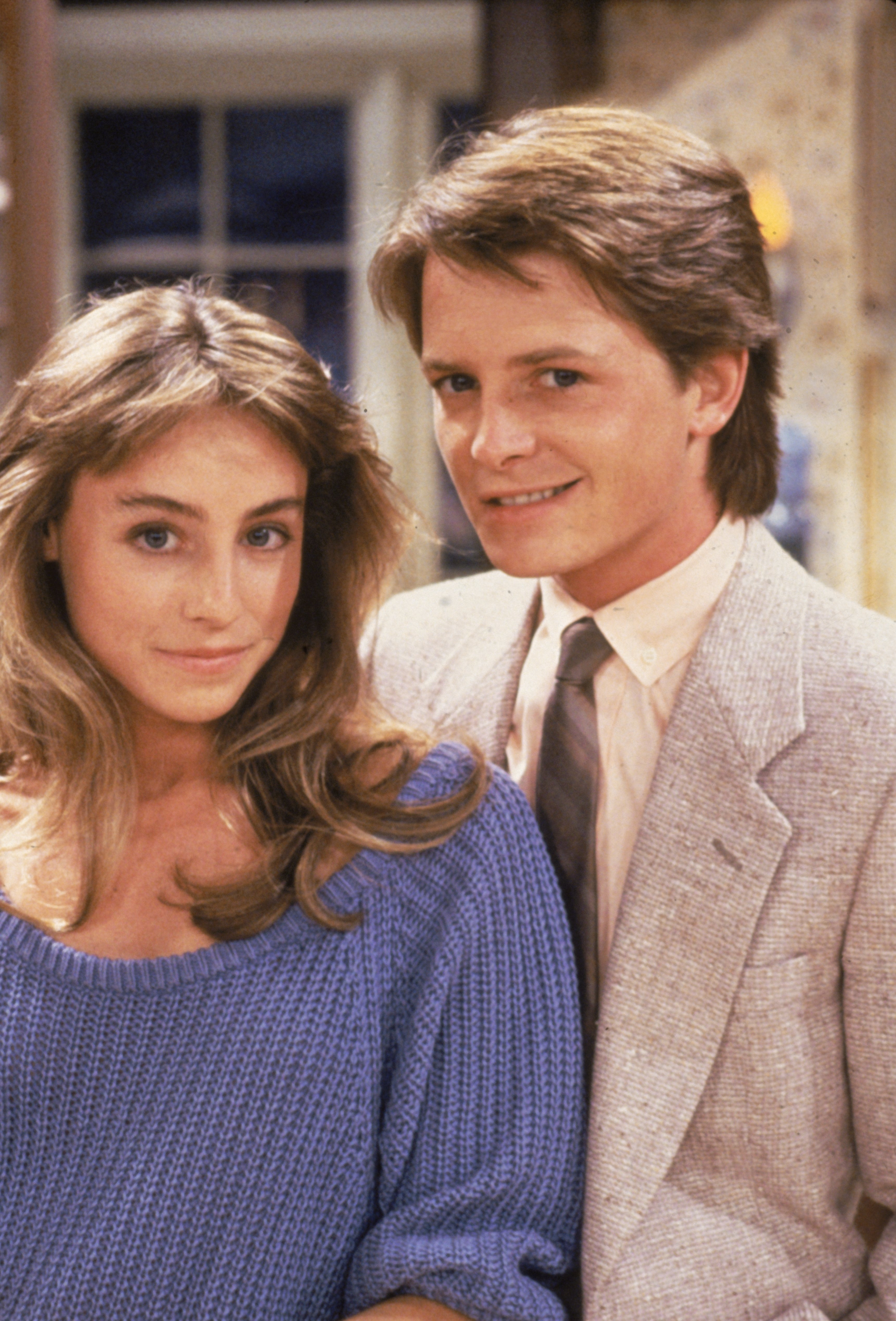 Promotional portrait of actors Michael J. Fox and Tracy Pollan on the set of the television series, "Family Ties." Fox and Pollan were married in 1988. | Source: Getty Images