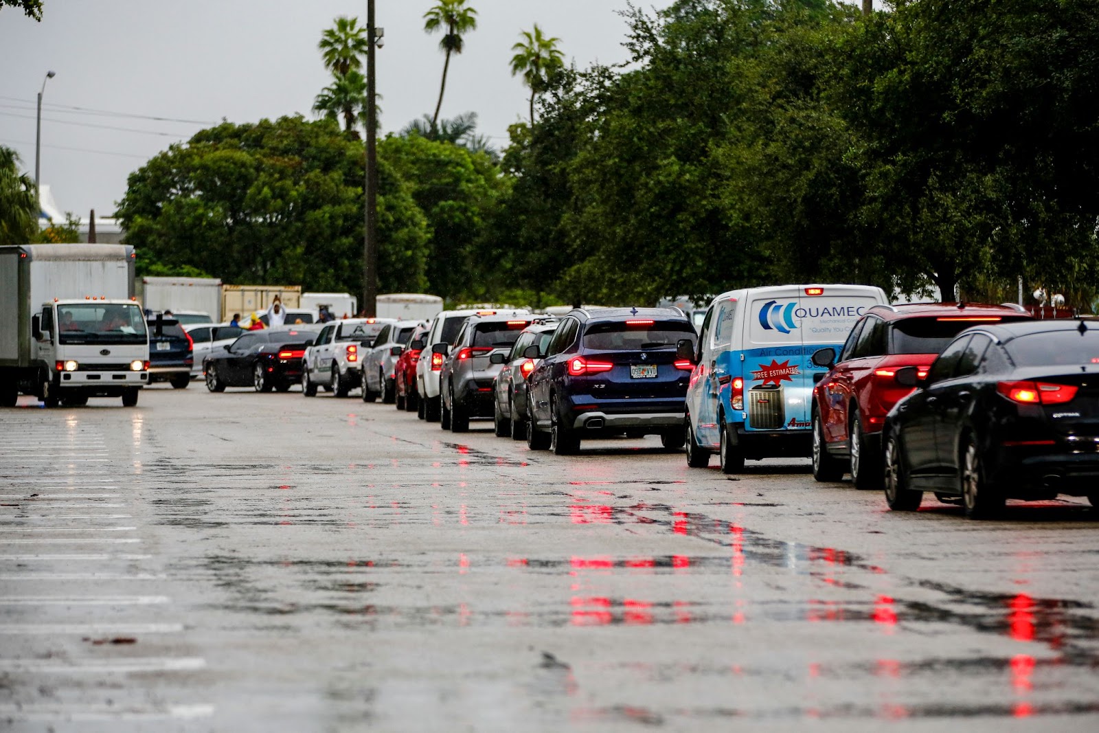 Residents waiting in line to get sandbags to ward off flooding ahead of Hurricane Milton in Miami, Florida. | Source: Getty Images