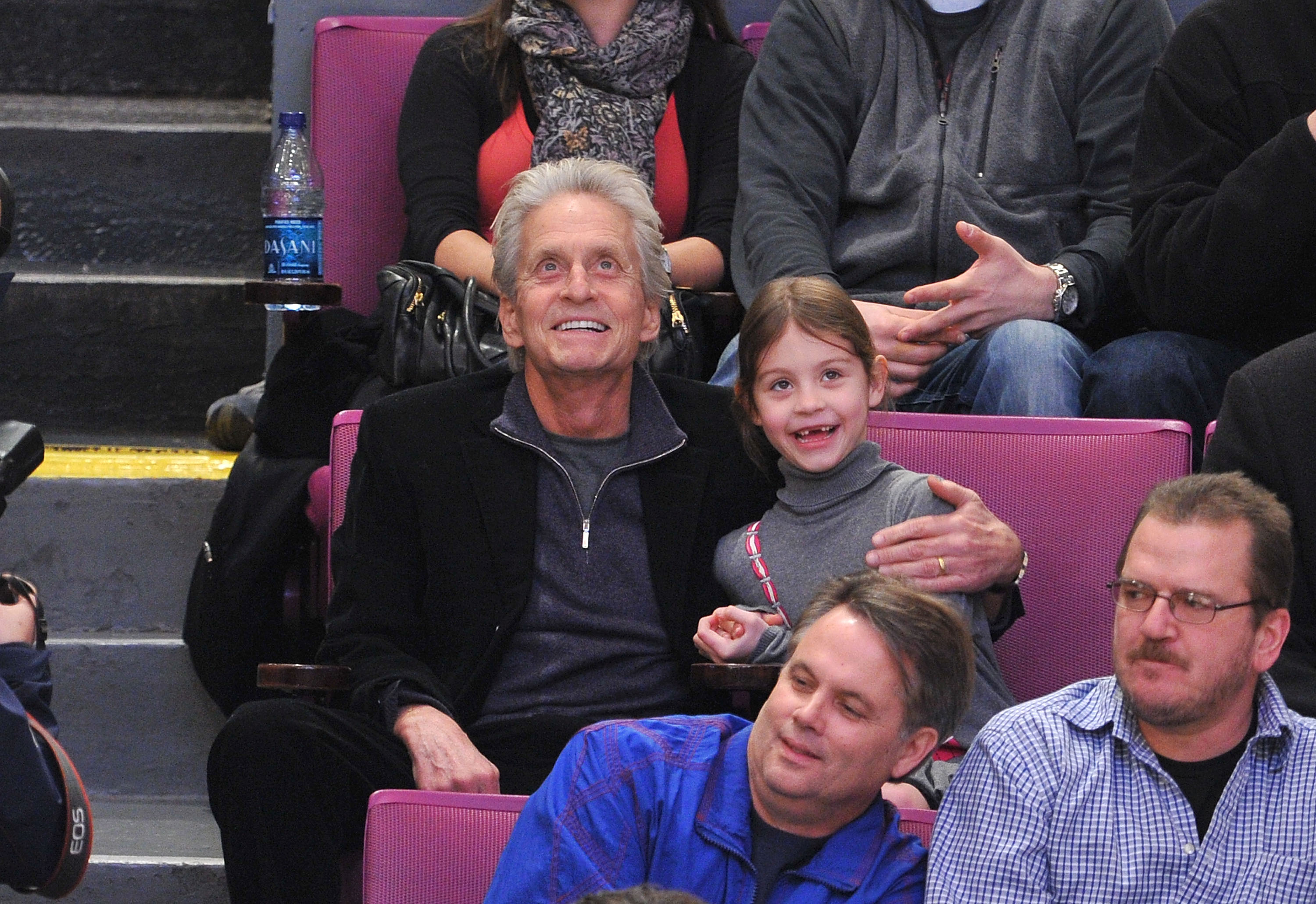 Michael Douglas and daughter Carys at Madison Square Garden on February 13, 2011 | Source: Getty Images