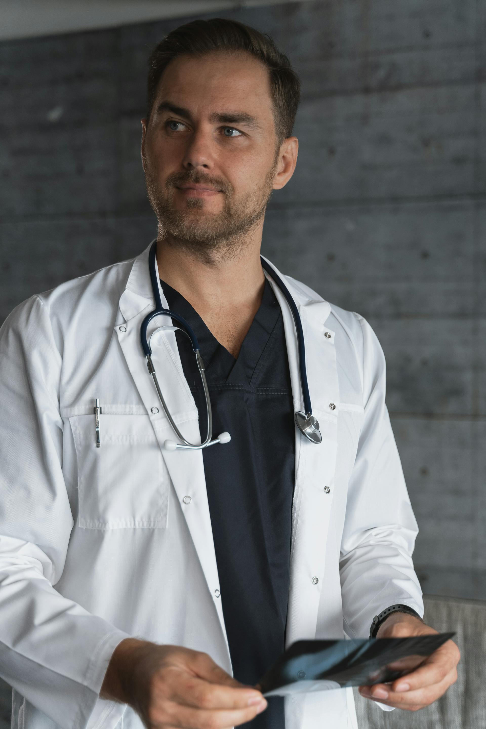 A male doctor looking at someone | Source: Pexels