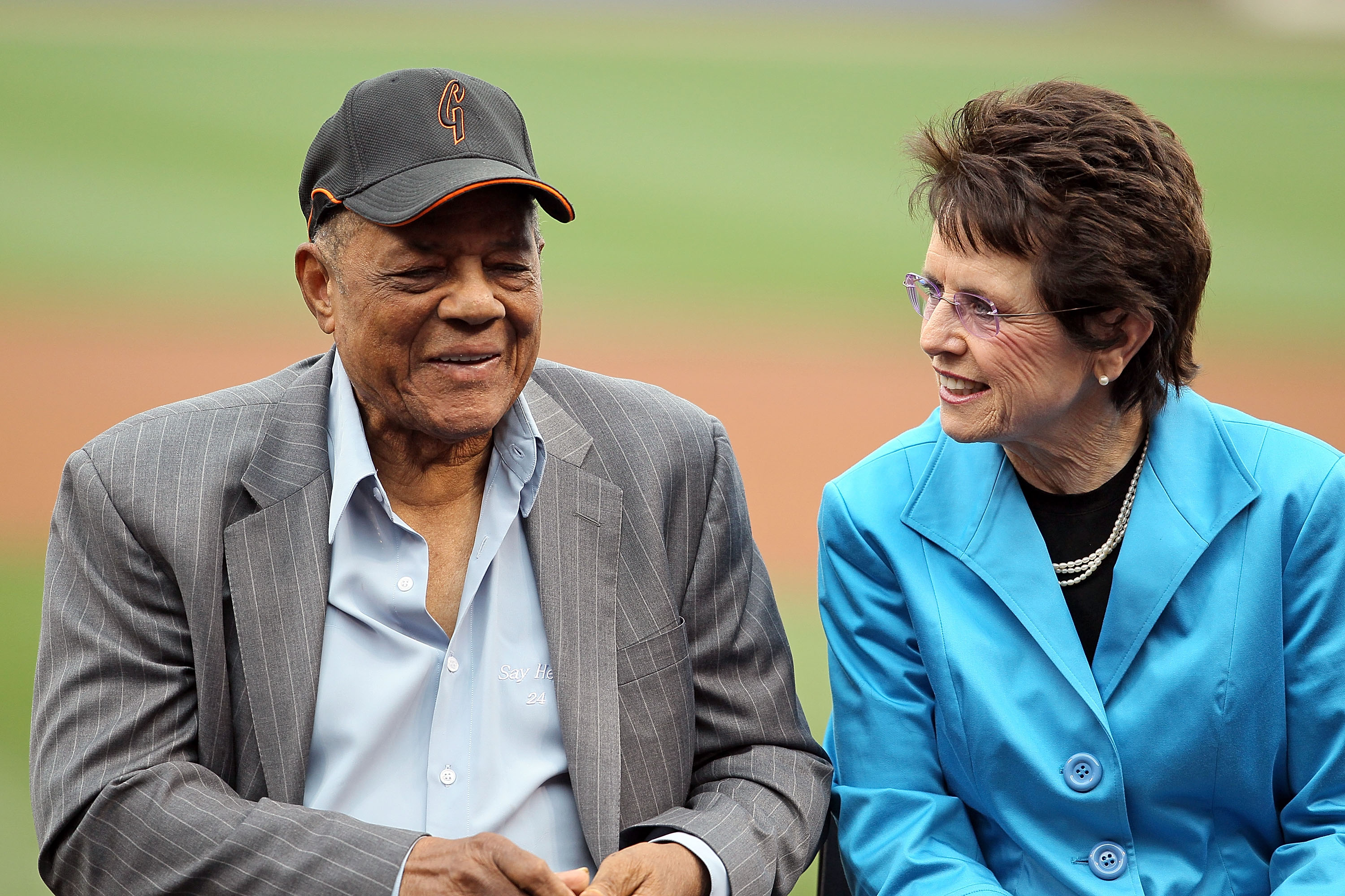 Willie Mays and Billie Jean King talk before receiving their Beacon Awards at the Civil Rights Game in Cincinnati on May 15, 2010. | Source: Getty Images