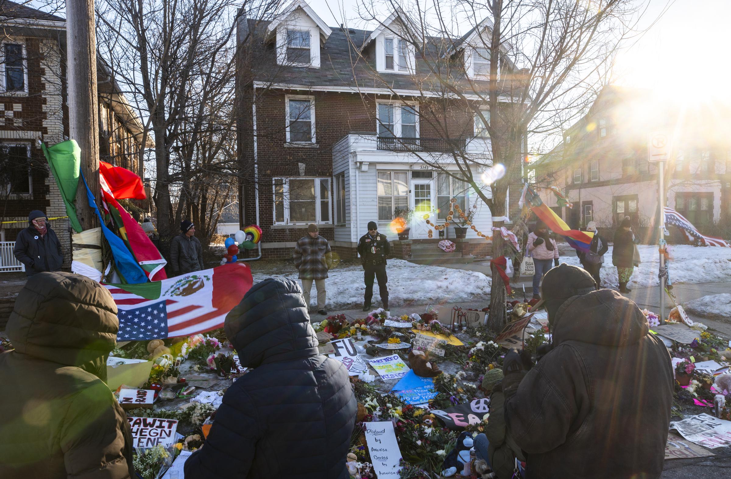 People hold a vigil for Renee Good in Minneapolis on January 14, 2026 | Source: Getty Images