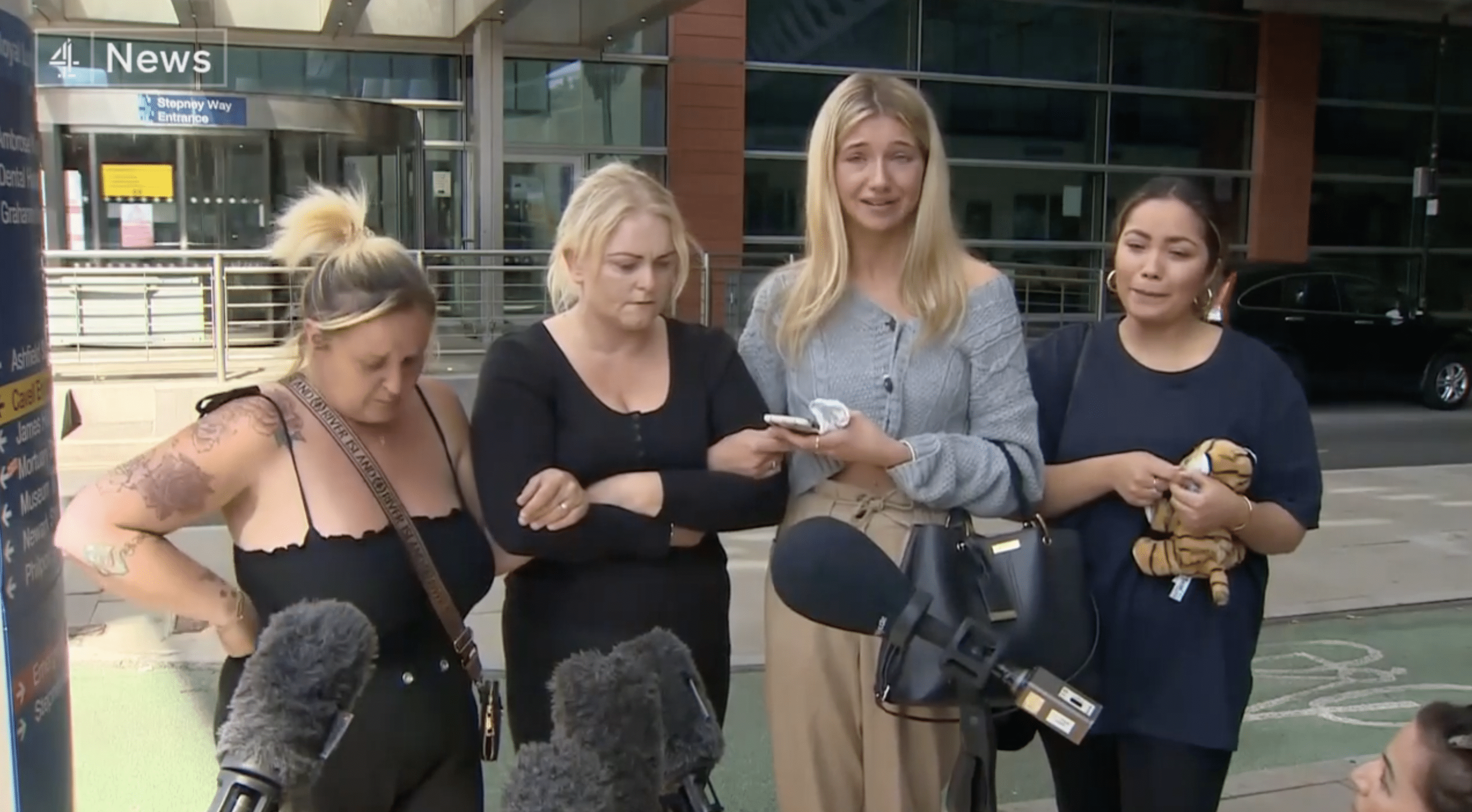 Archie Battersbee's mom, Hollie Dance, sister-in-law, Ella Carter, and other relatives gather outside the hospital to share their thoughts and feelings. | Source: facebook.com/Channel4News