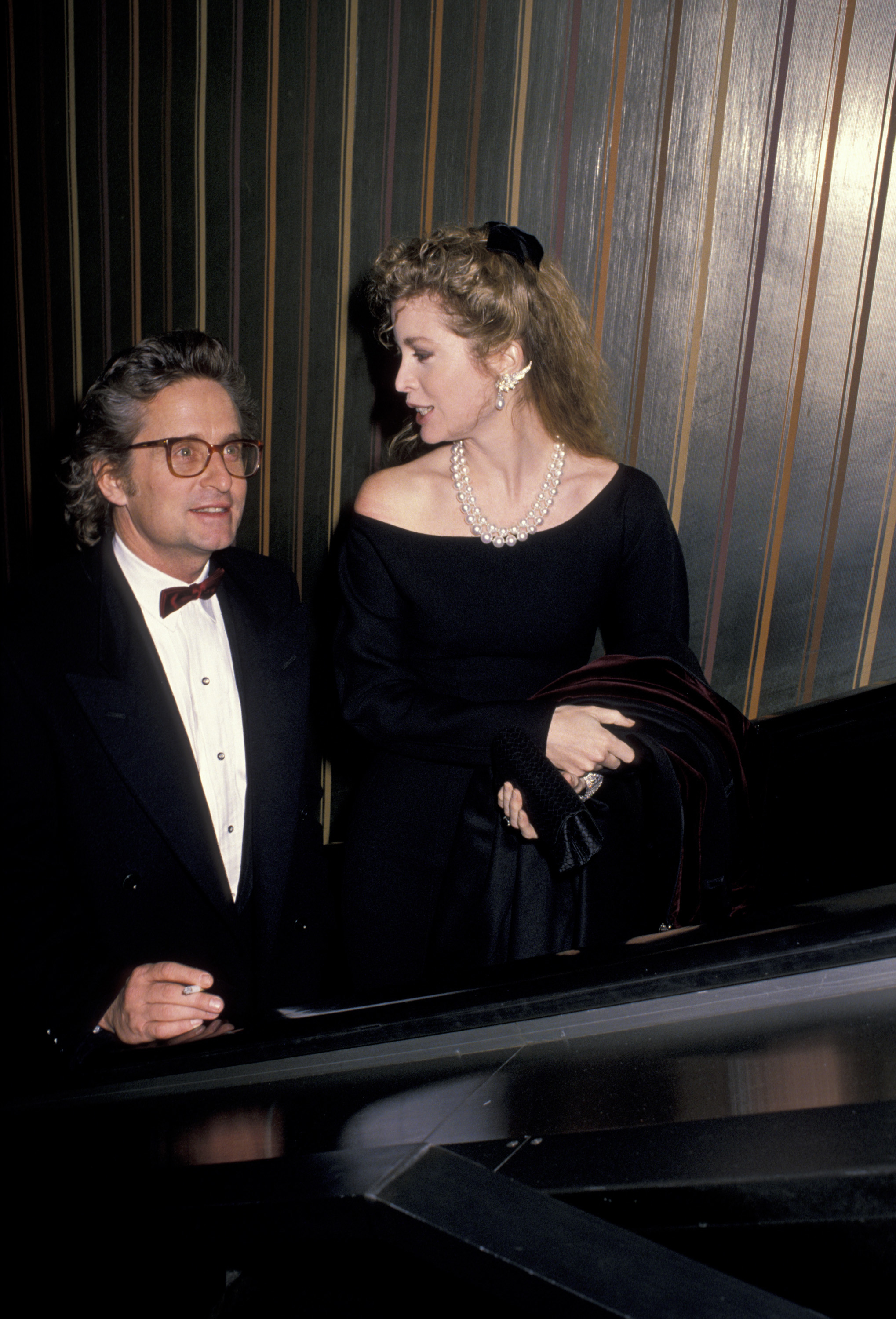 Michael and Diandra Douglas during the premiere of "Rain Man," 1988 | Source: Getty Images