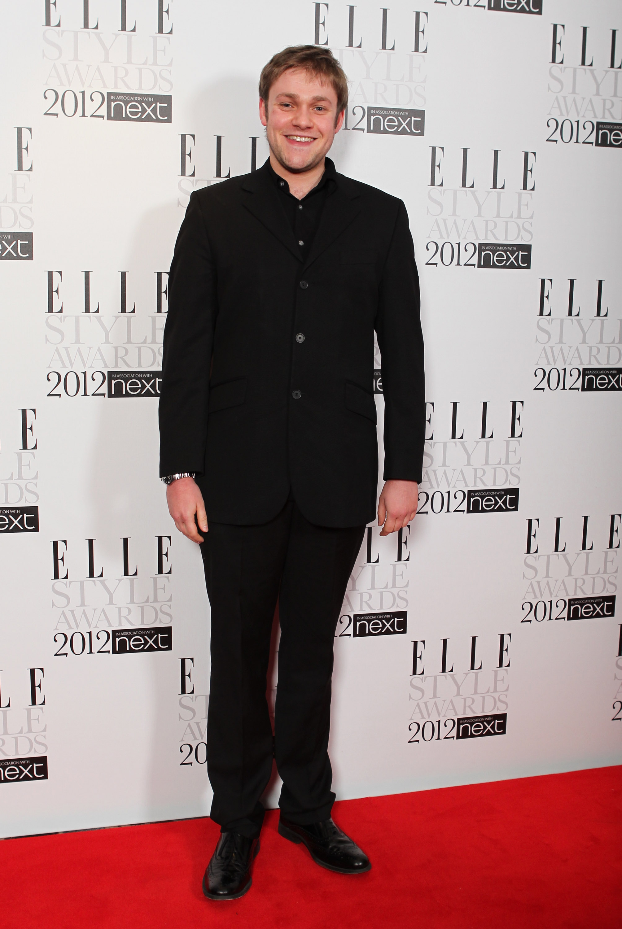 Thomas Howes hit the red carpet at the ELLE Style Awards in 2012 with a youthful energy and clean-cut look. Dressed in an all-black suit and shirt, he kept things simple and relaxed while enjoying the spotlight during the early days of his "Downton Abbey" fame.