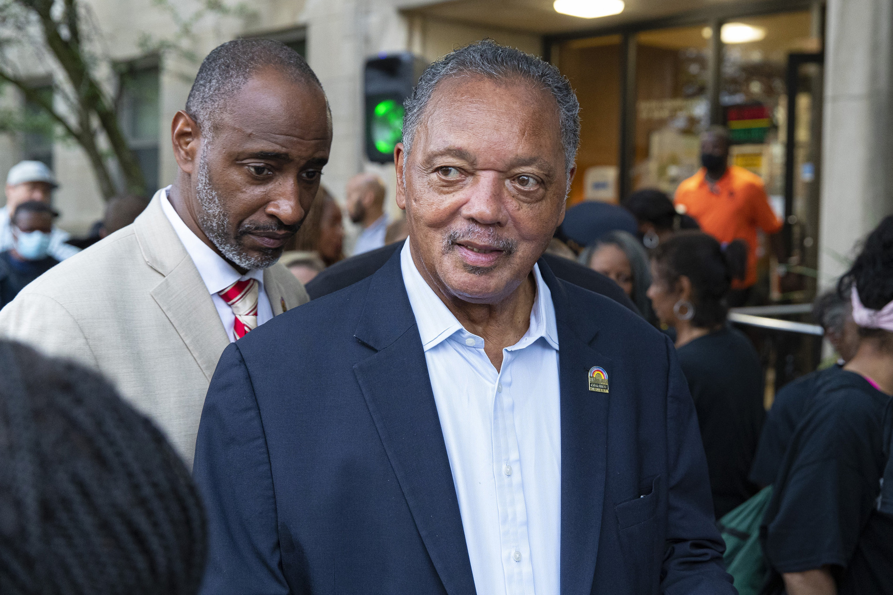 Rev. Jesse Jackson walks to the front of the "Invading our community with peace" weekly Friday walk led by St. Sabina Church in Auburn Gresham, Chicago, on June 25, 2021 | Source: Getty Images